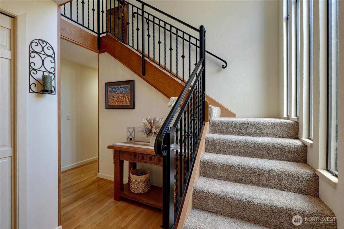 Light filled staircase brings natural light into the interior of the home!