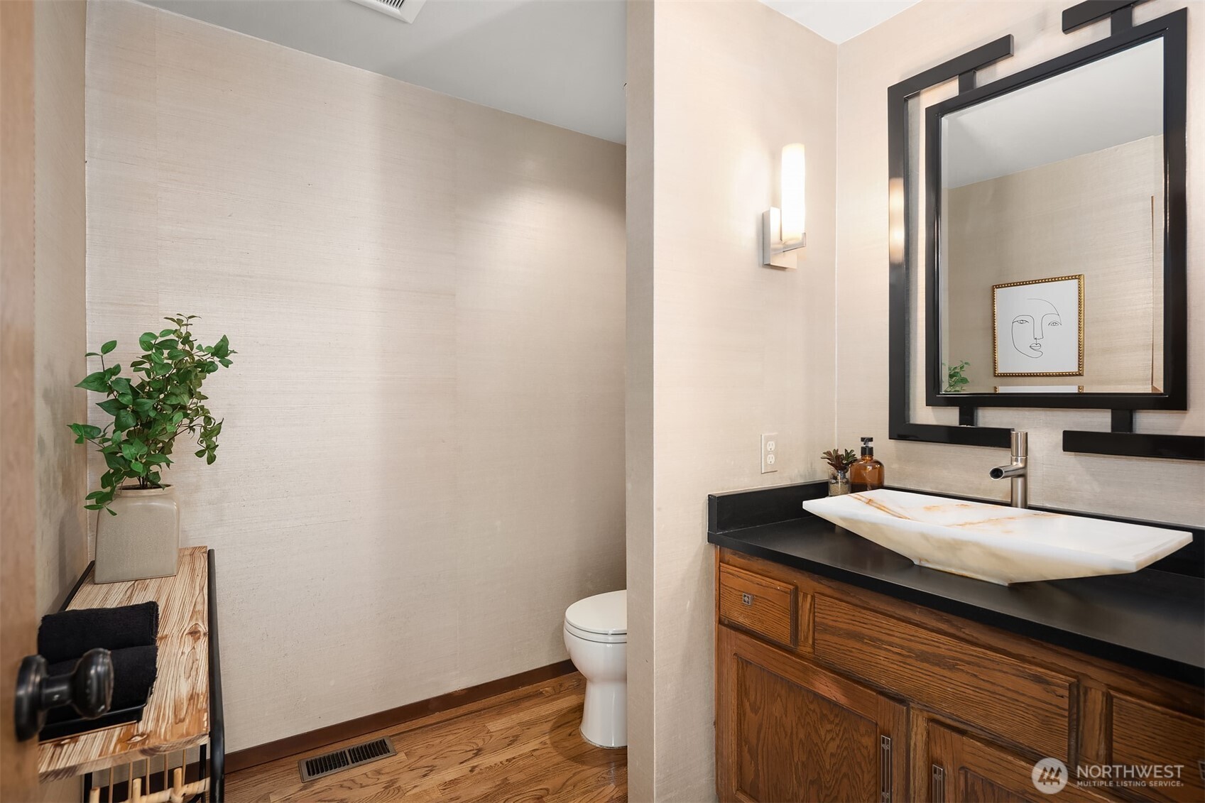 Main floor powder room with vessel sink.