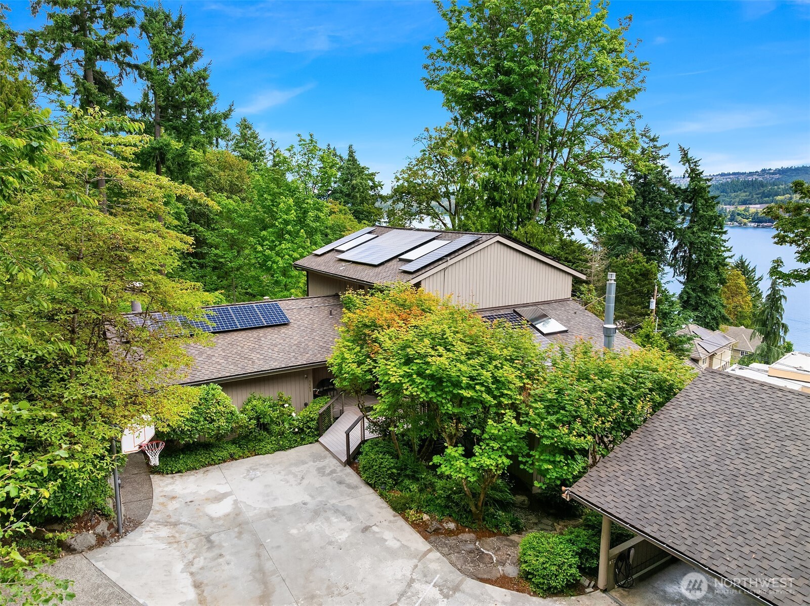 Solar panels & a whole house generator + battery backup system provide peace of mind.