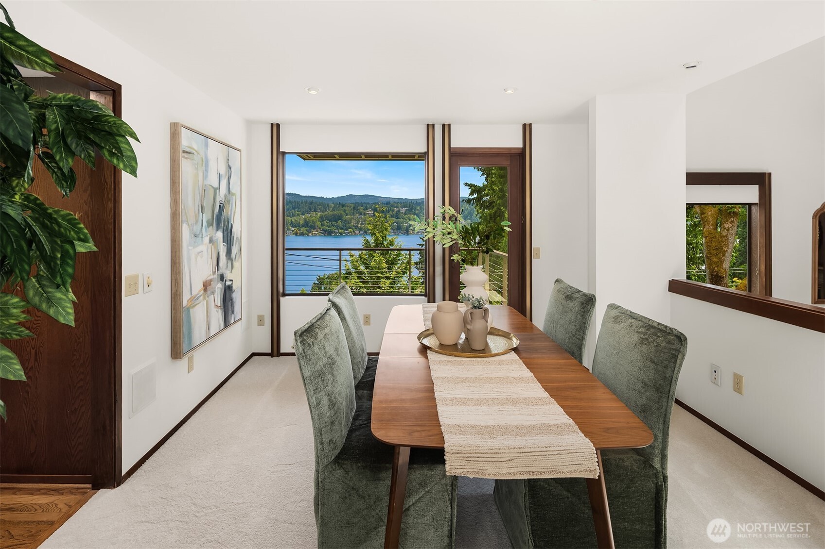 Host alongside sparkling lake views in the spacious dining room.