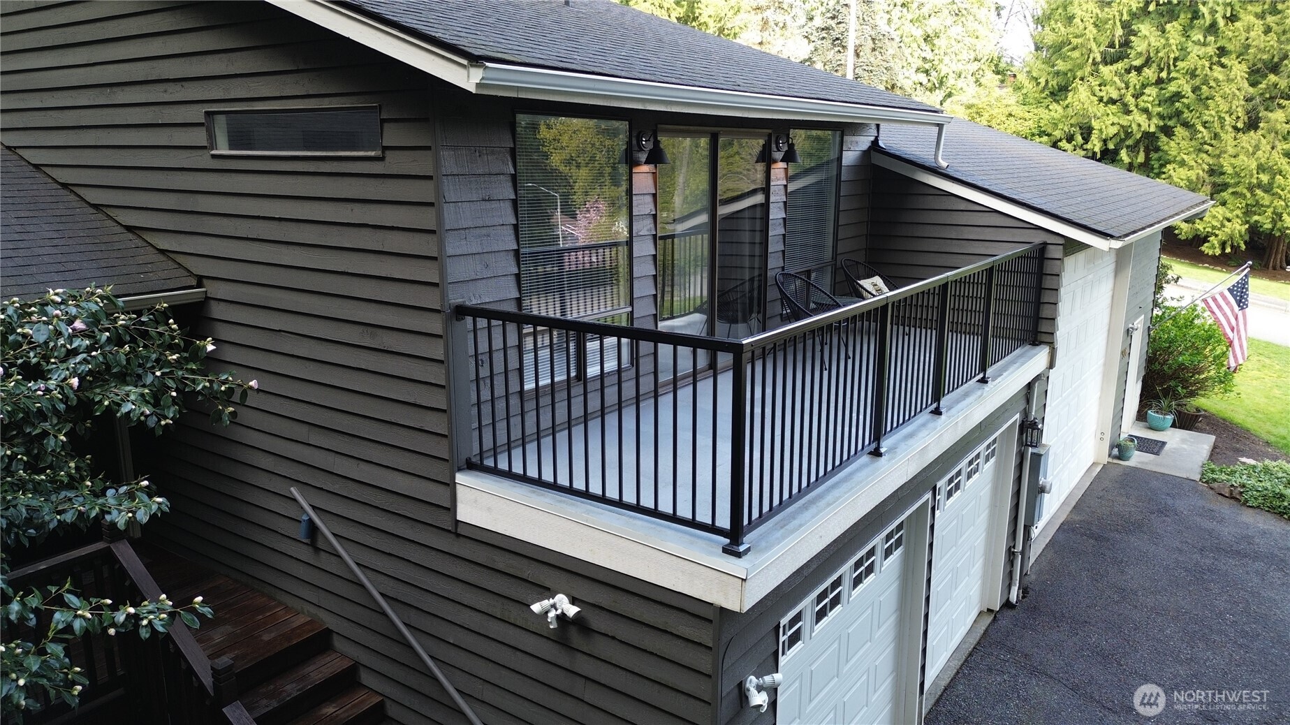 Primary deck off bedroom. Recently resurfaced & New rail!