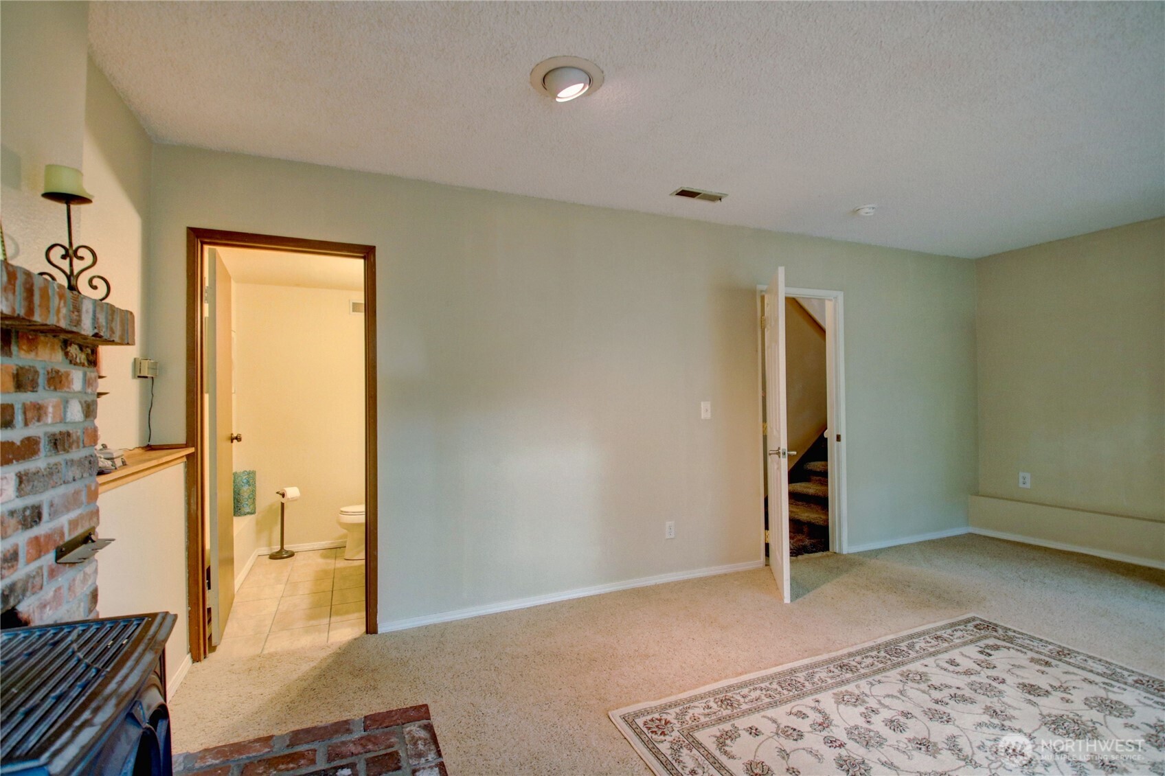 Family room to 1/2 bath down stairs. Would make a great 4th bedroom.