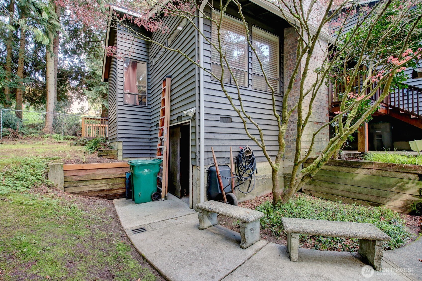 To the left of the front door, access to storage area