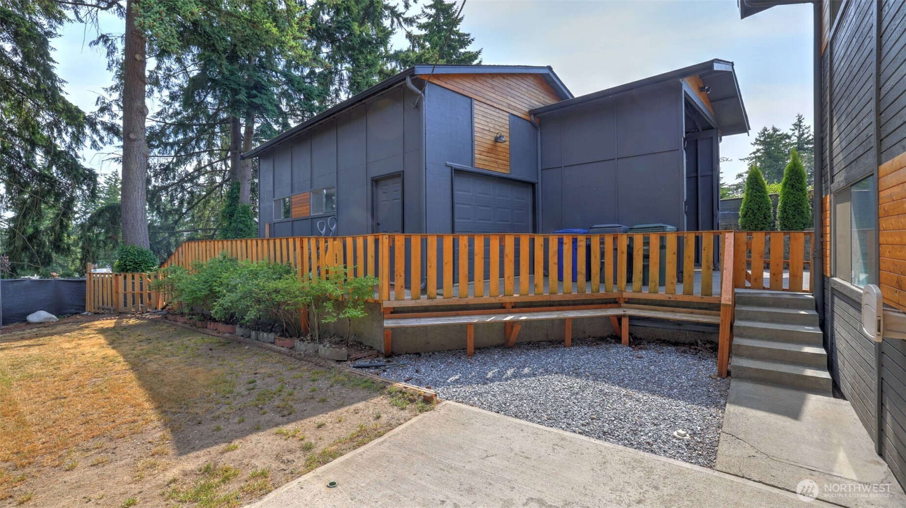Oversized detached shop with room for RV or 2 additional vehicles plus shop space and storage loft.
