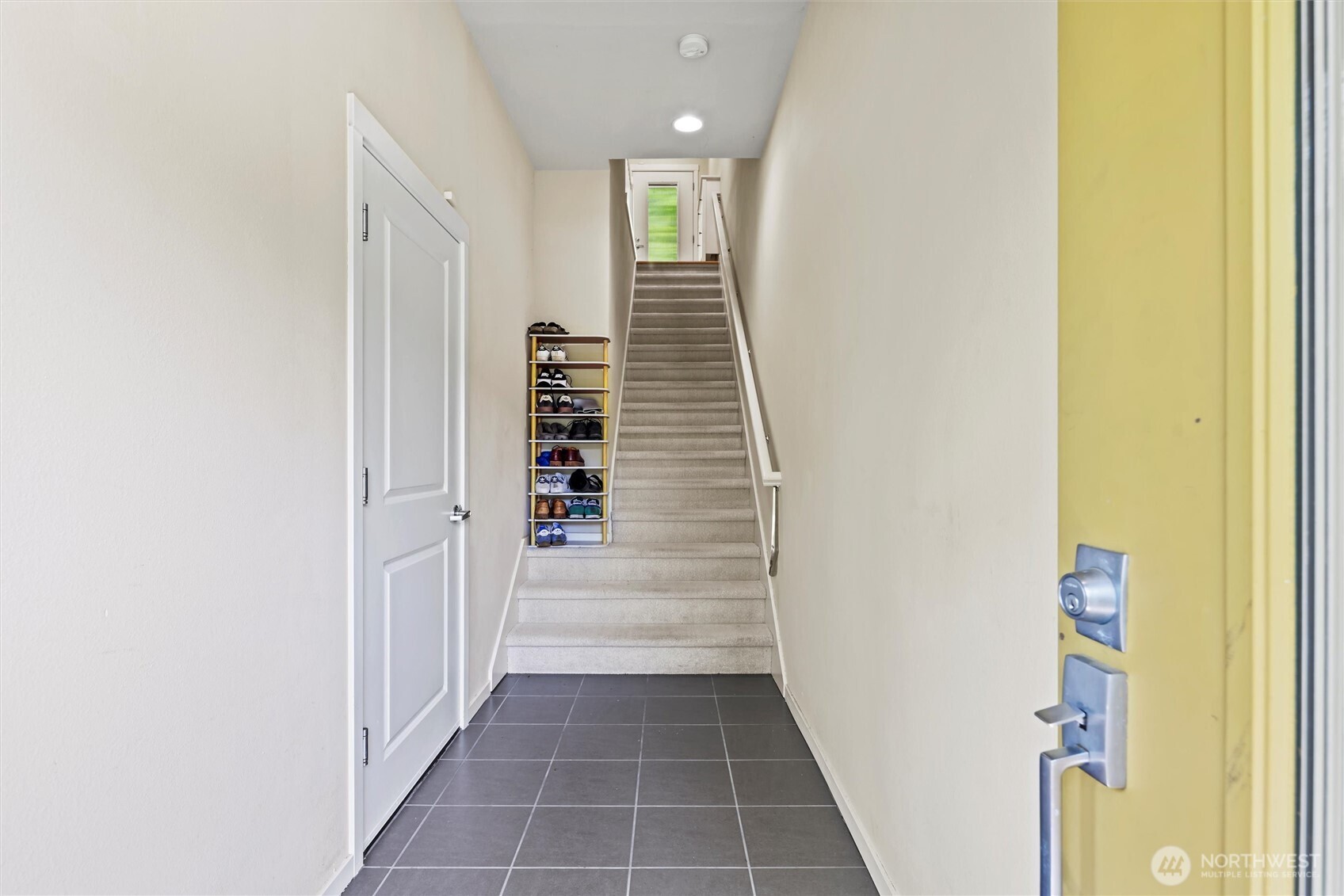 Second entrance on the lower, garage level