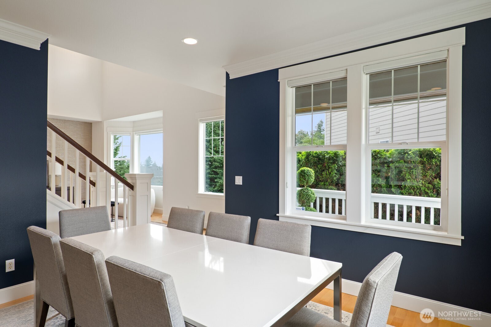 Dining Room Framed by Big, Bright Windows