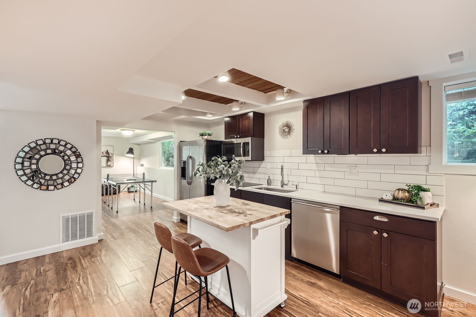 The lower level kitchen is spacious and functional