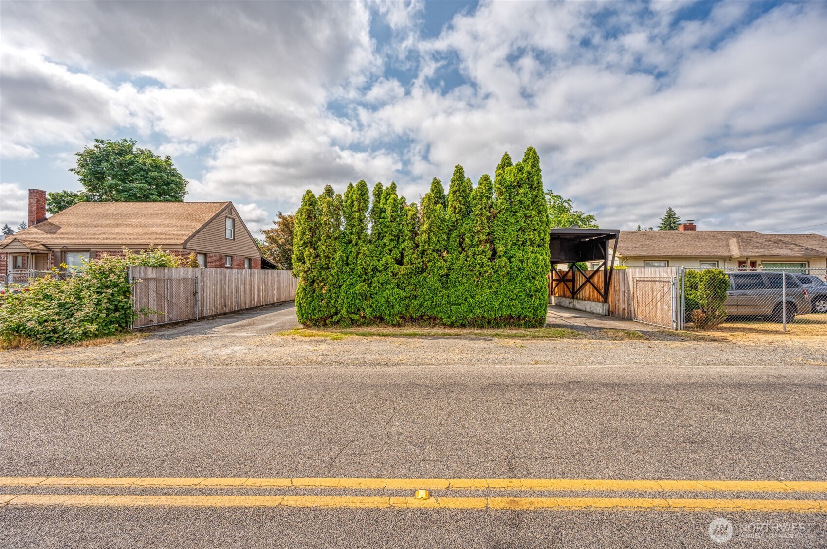 From the road, 125th, total privacy to the front of the house. Super nice buffer!