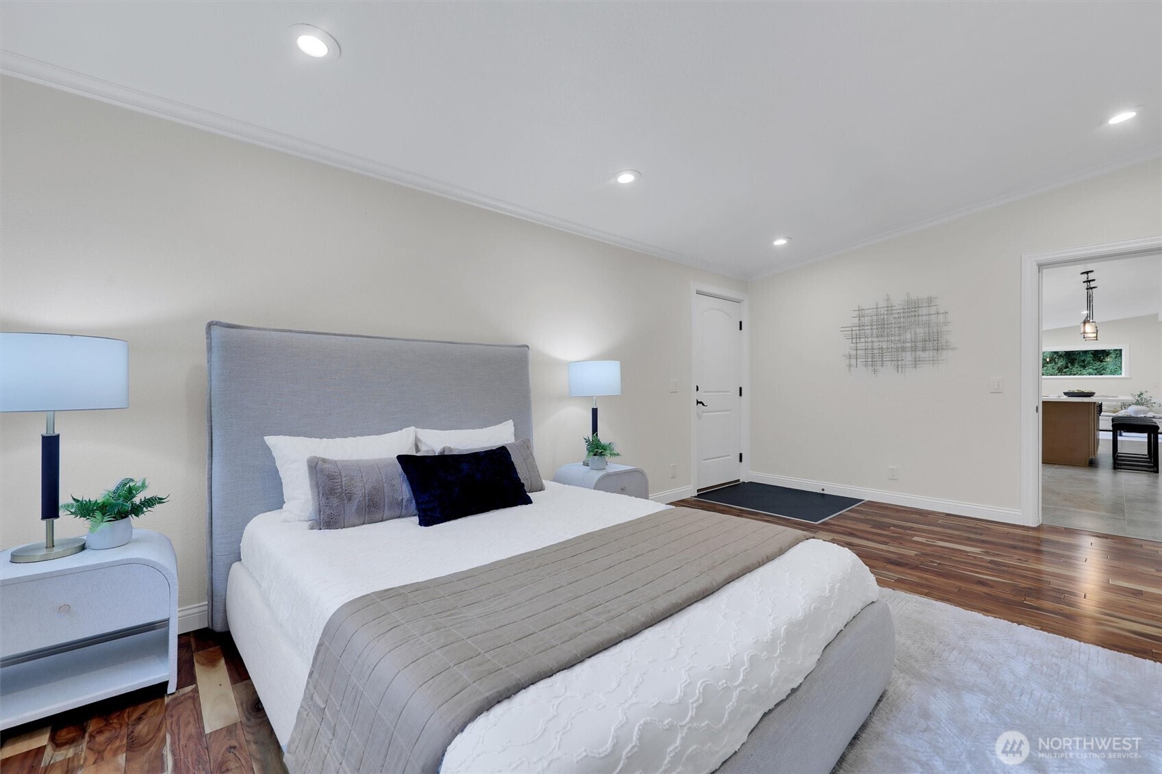 Primary bedroom retreat with fresh finishes and calming views.