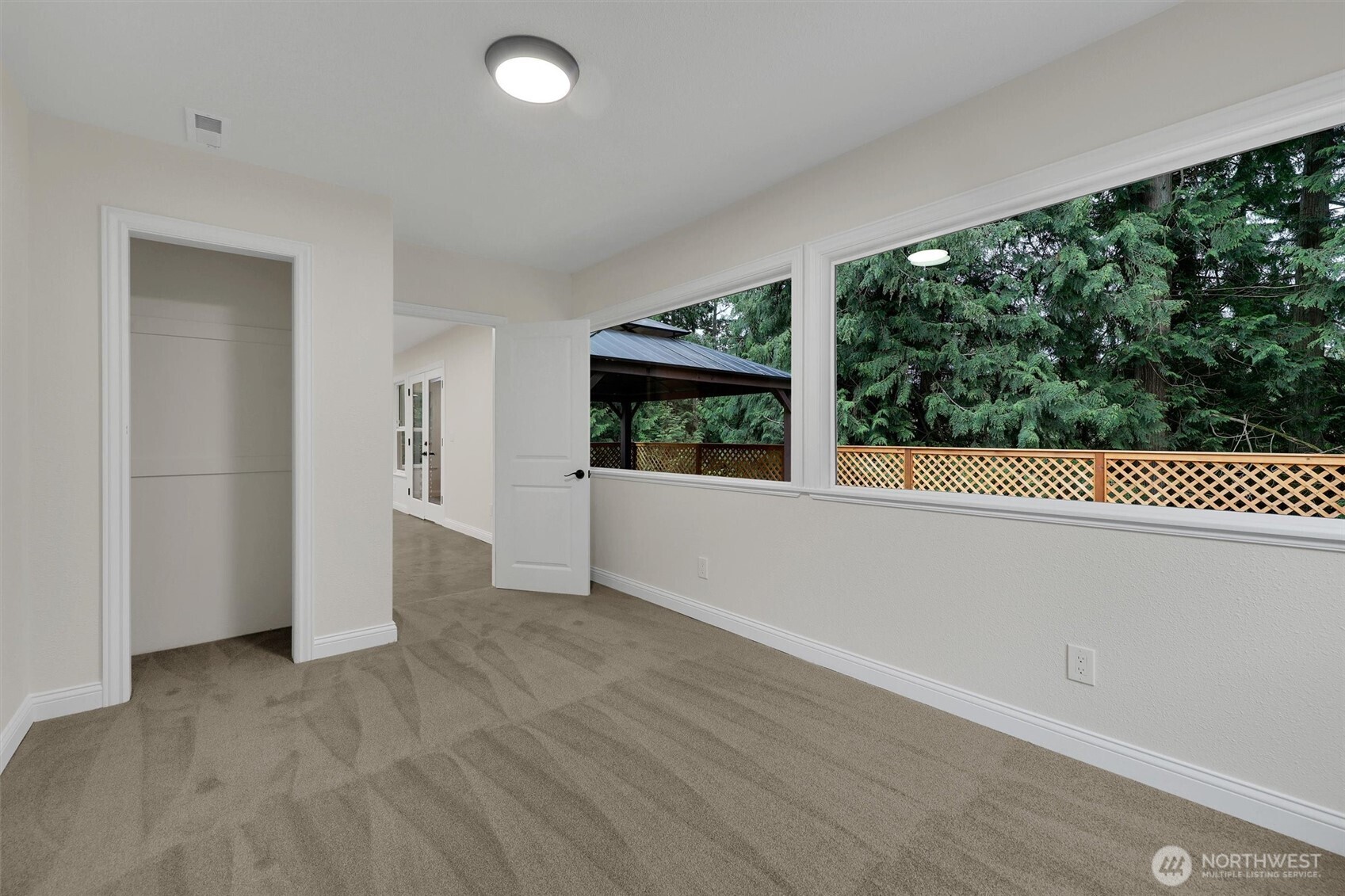 Updated windows in this 2nd bedroom bring energy efficiency and style.