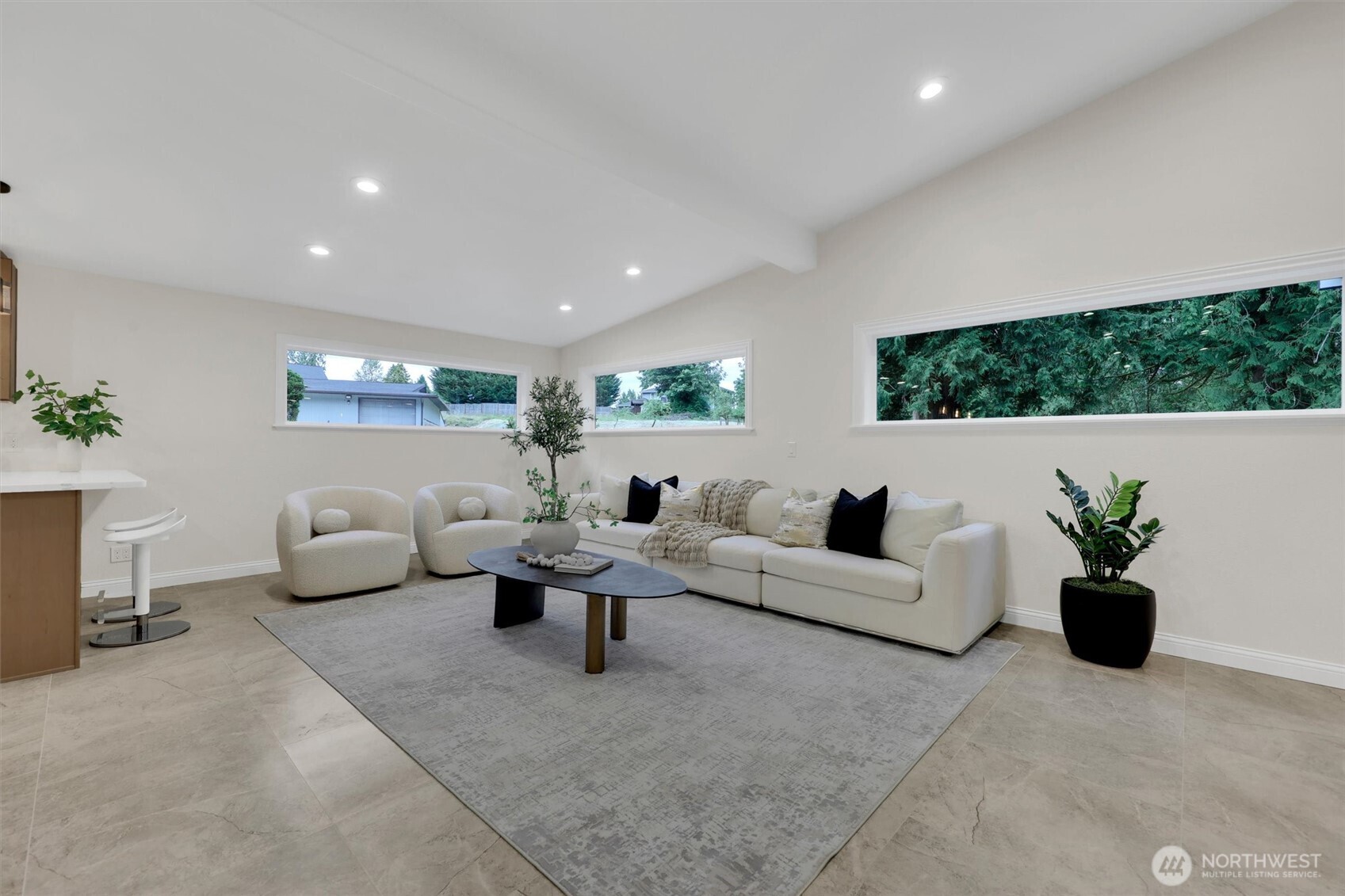 Vaulted ceilings and natural light give this space a cozy, open feel.