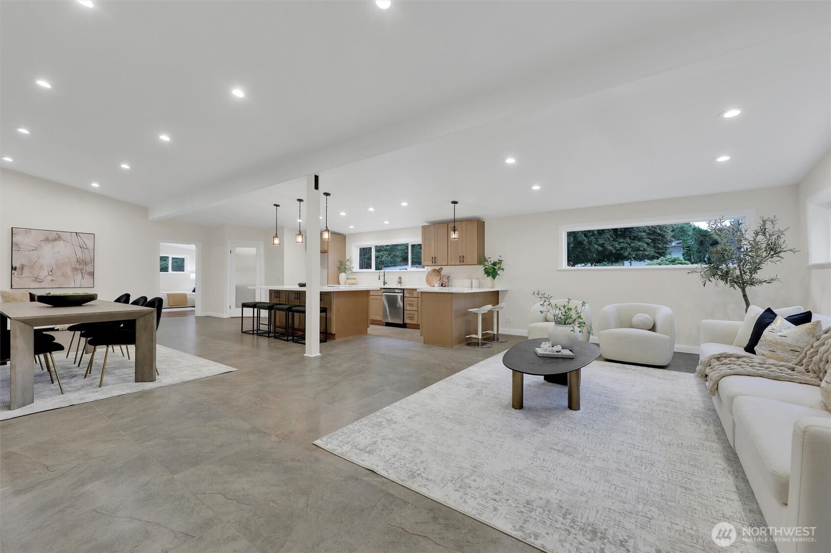 Fresh interior paint and stylish new flooring throughout.