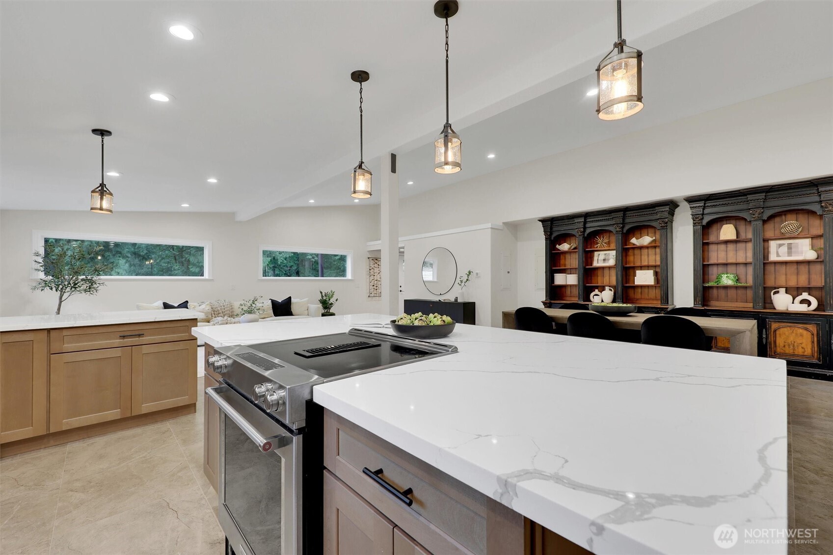 Gorgeous new countertops and cabinetry throughout the kitchen.