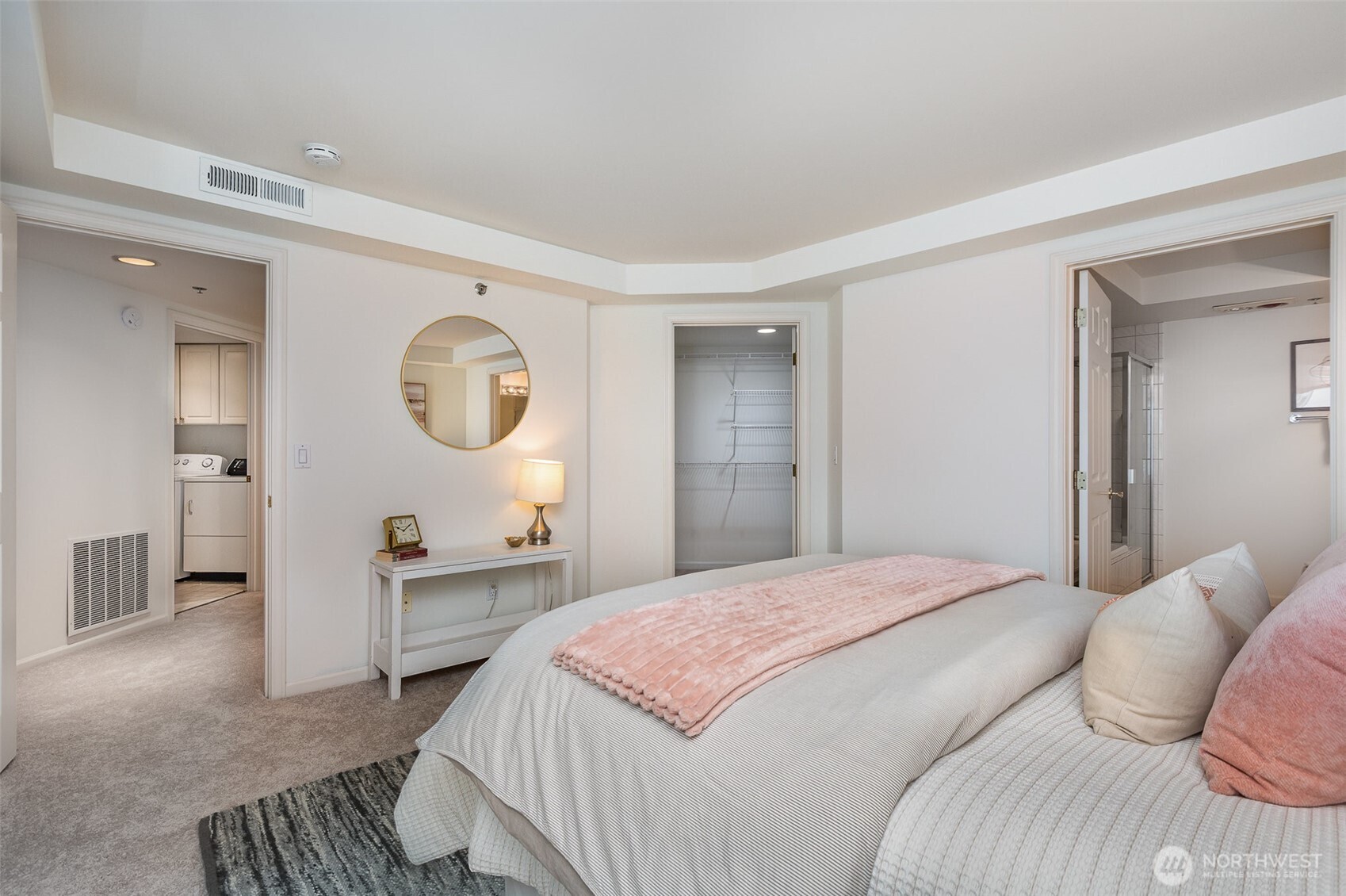 Enjoy the convenience of a spacious walk-in closet and direct access to the 5-piece ensuite, all thoughtfully tucked away for privacy and everyday ease.