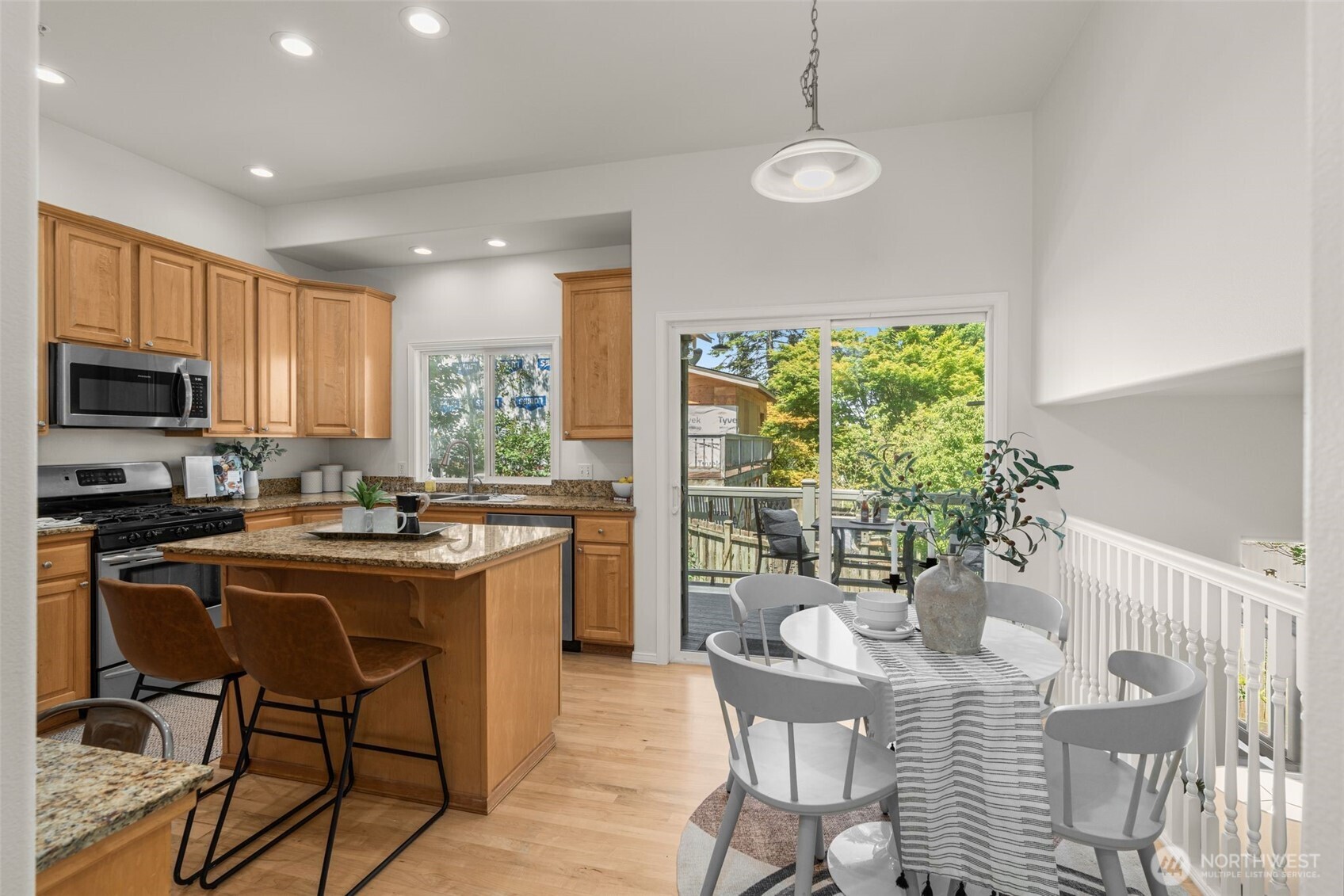 Eat at the island, in-kitchen dining area, dining table, or…