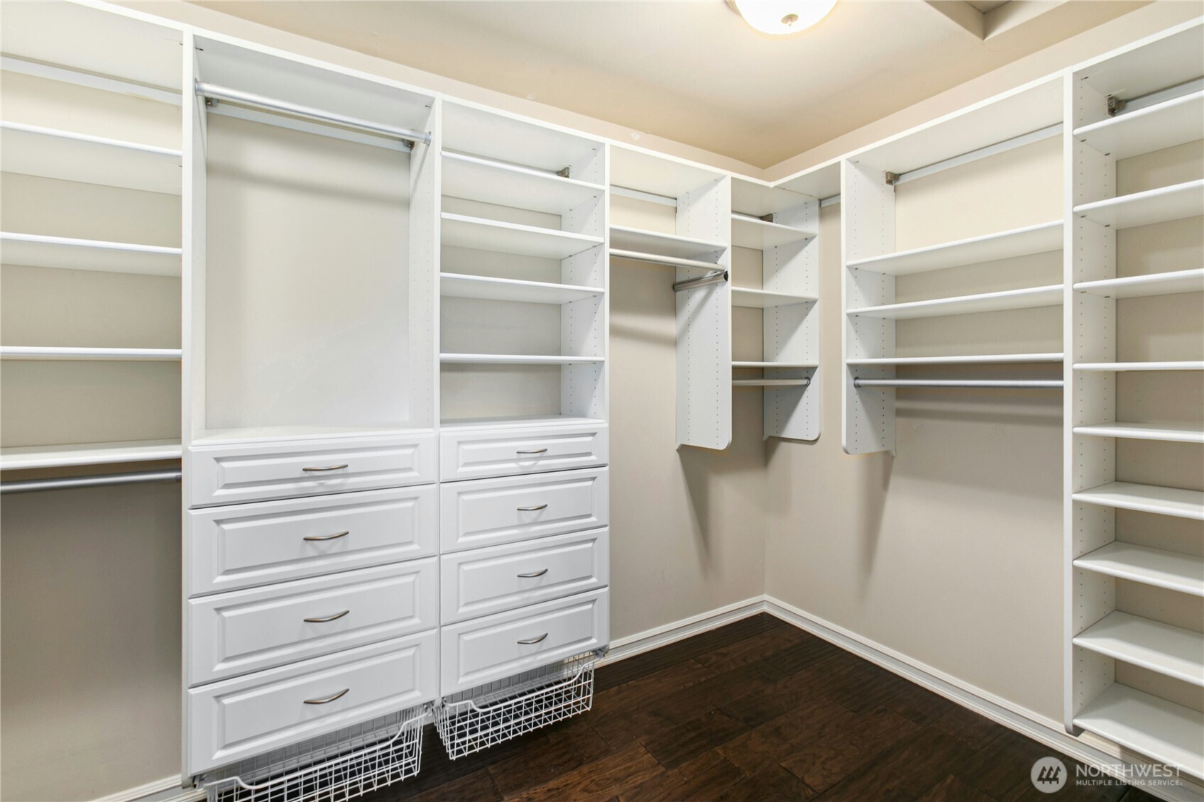 Primary bedroom walk in closet