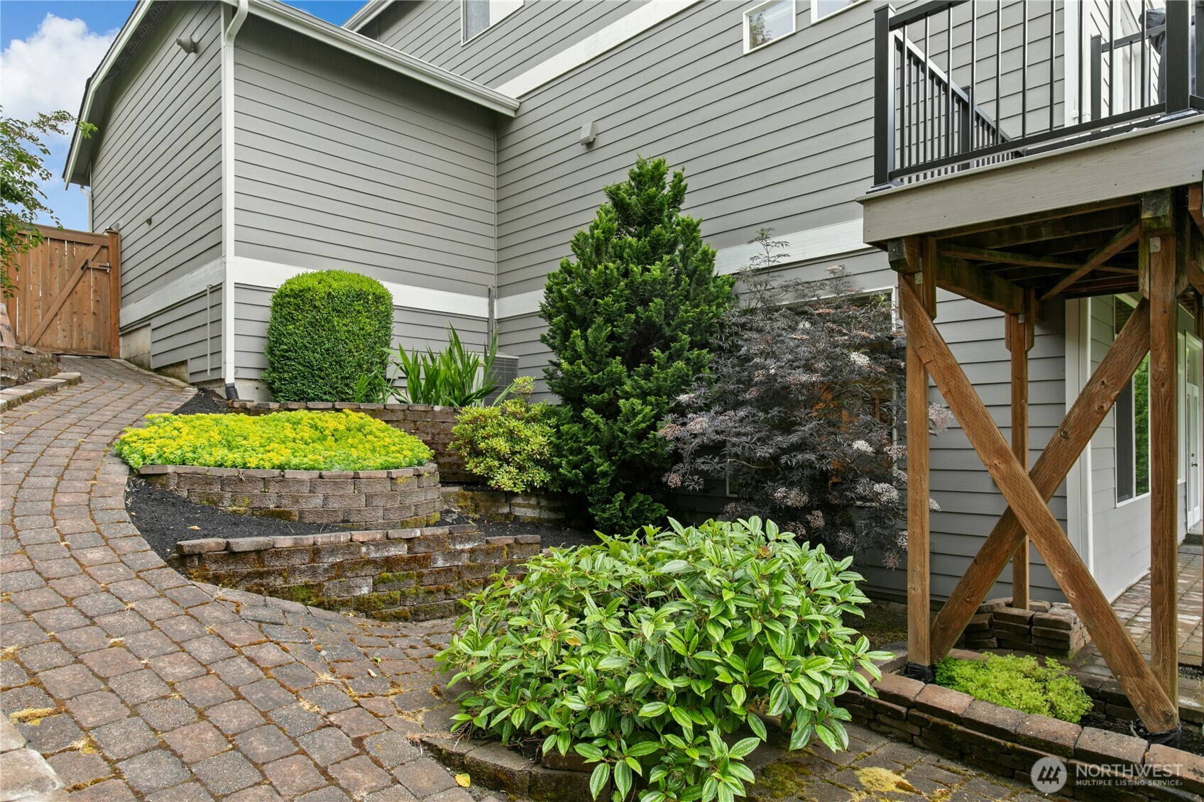 Pavered and Tiered side yard offers function & style