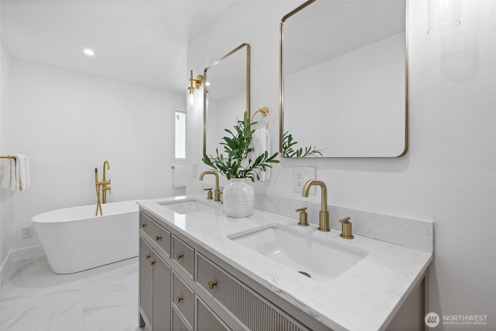 Fully remodeled en suite with dual vanity.