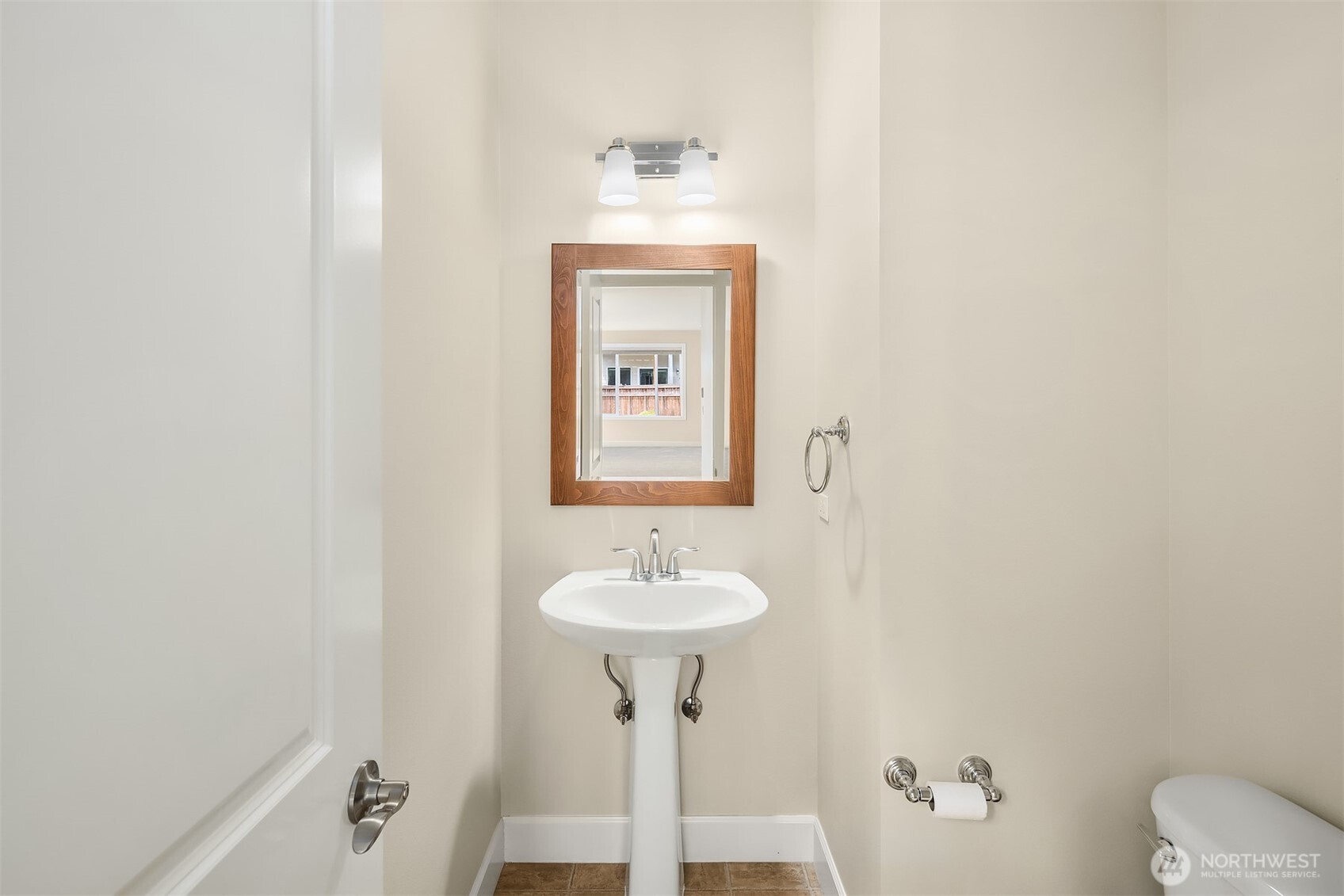 Powder room conveniently located on Main