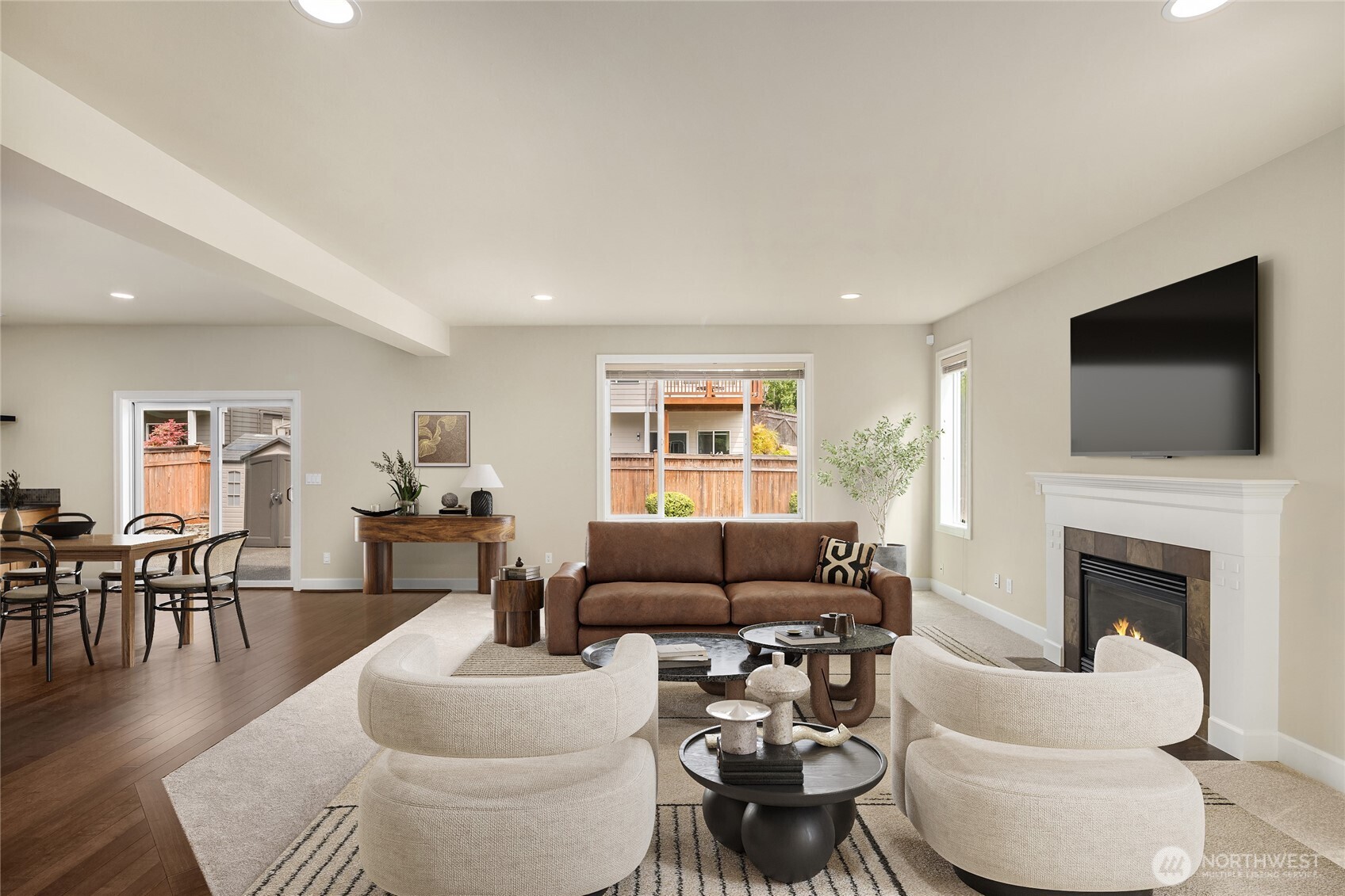 The sun's rays are streaming thru the large windows into this marvelous great room.