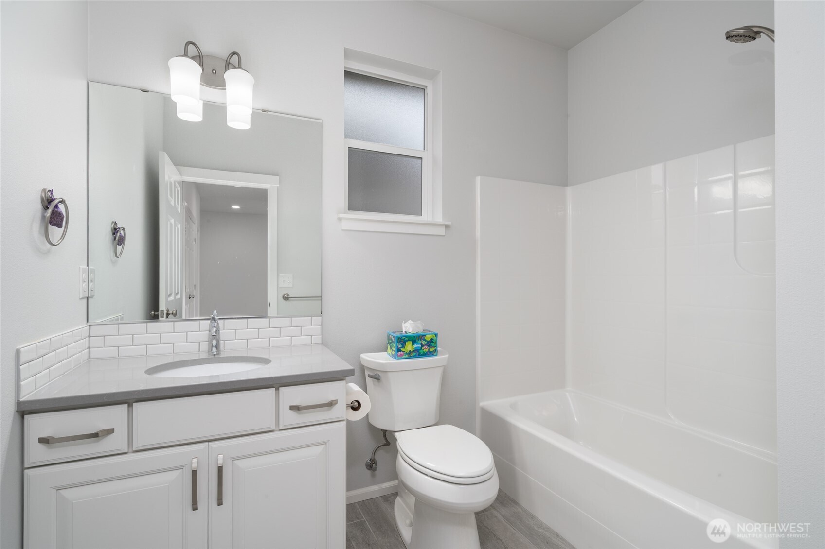 Primary bath with seperate toilet.