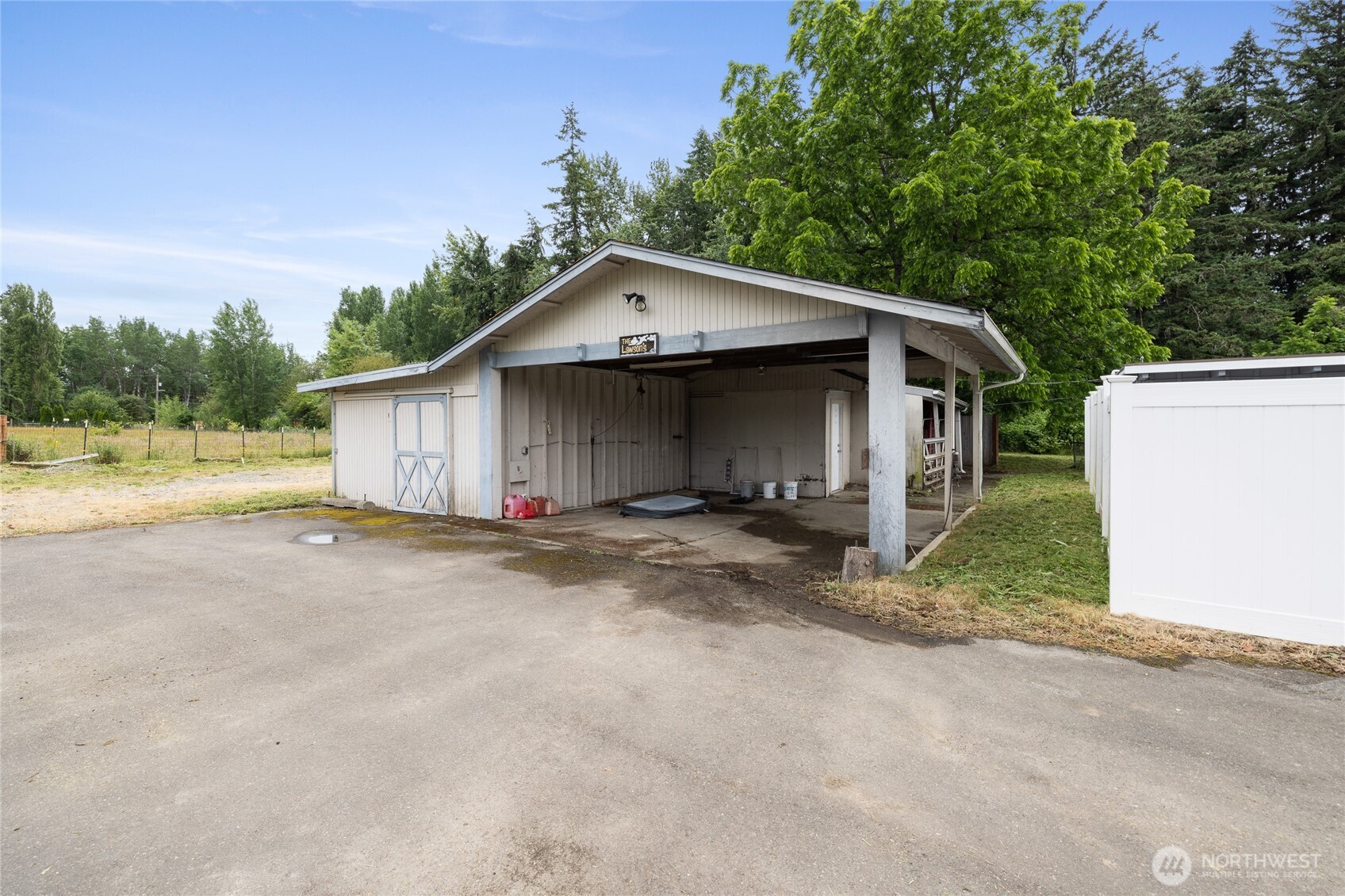 Carport /shop in backyard.