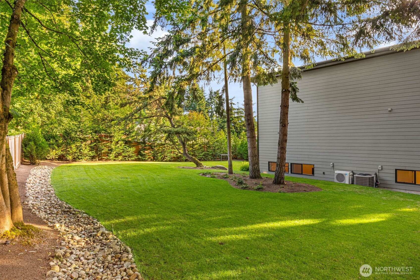 Large level fenced yard.