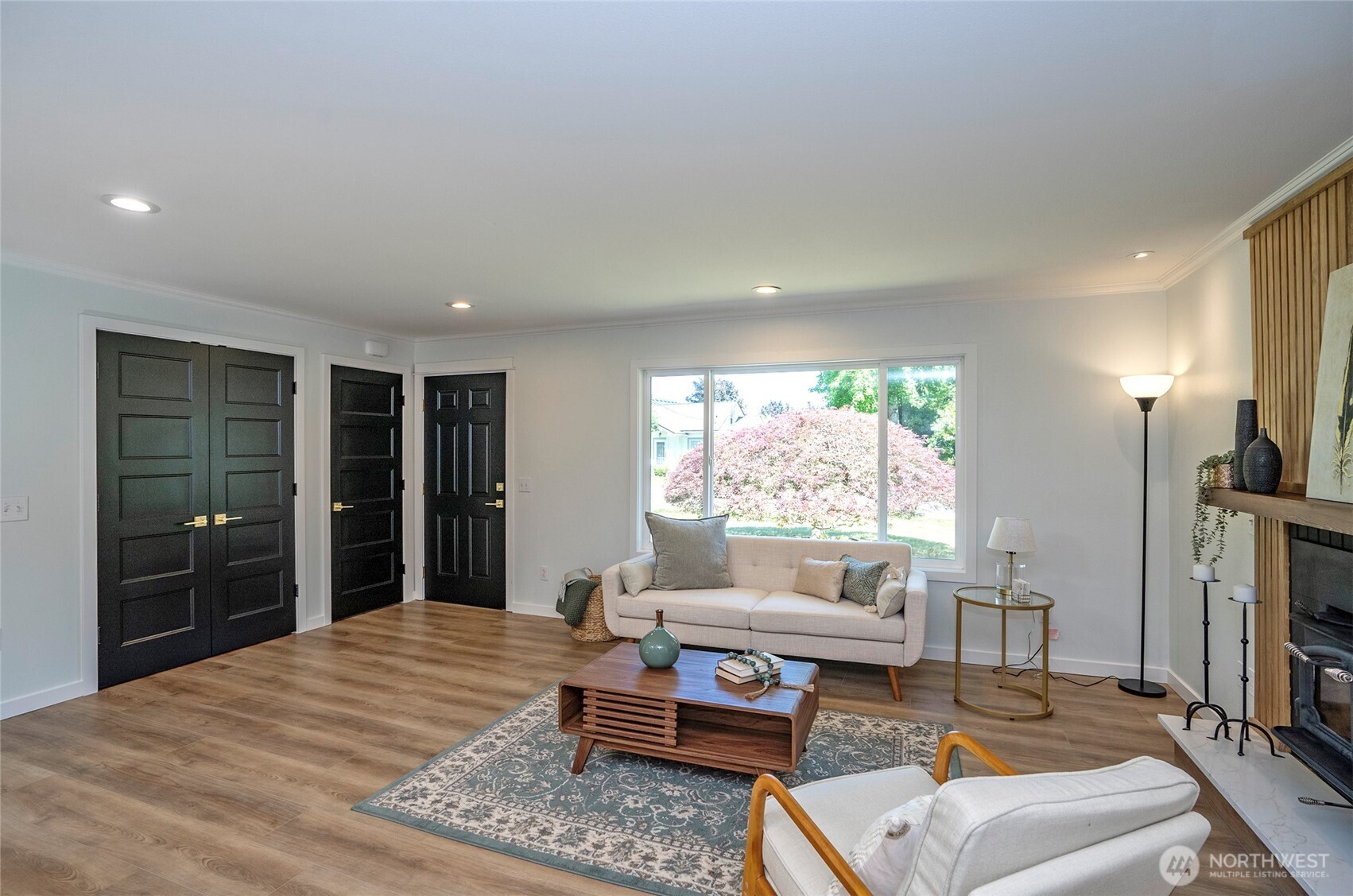 Beautiful doors with fin brass finishes complement the home.
