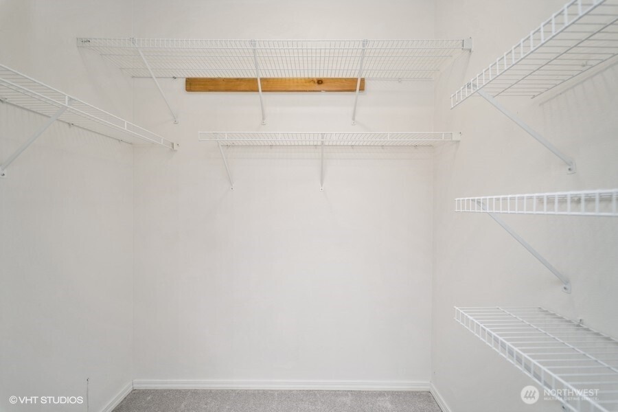 Alternate view of full bathroom with extended counter space.