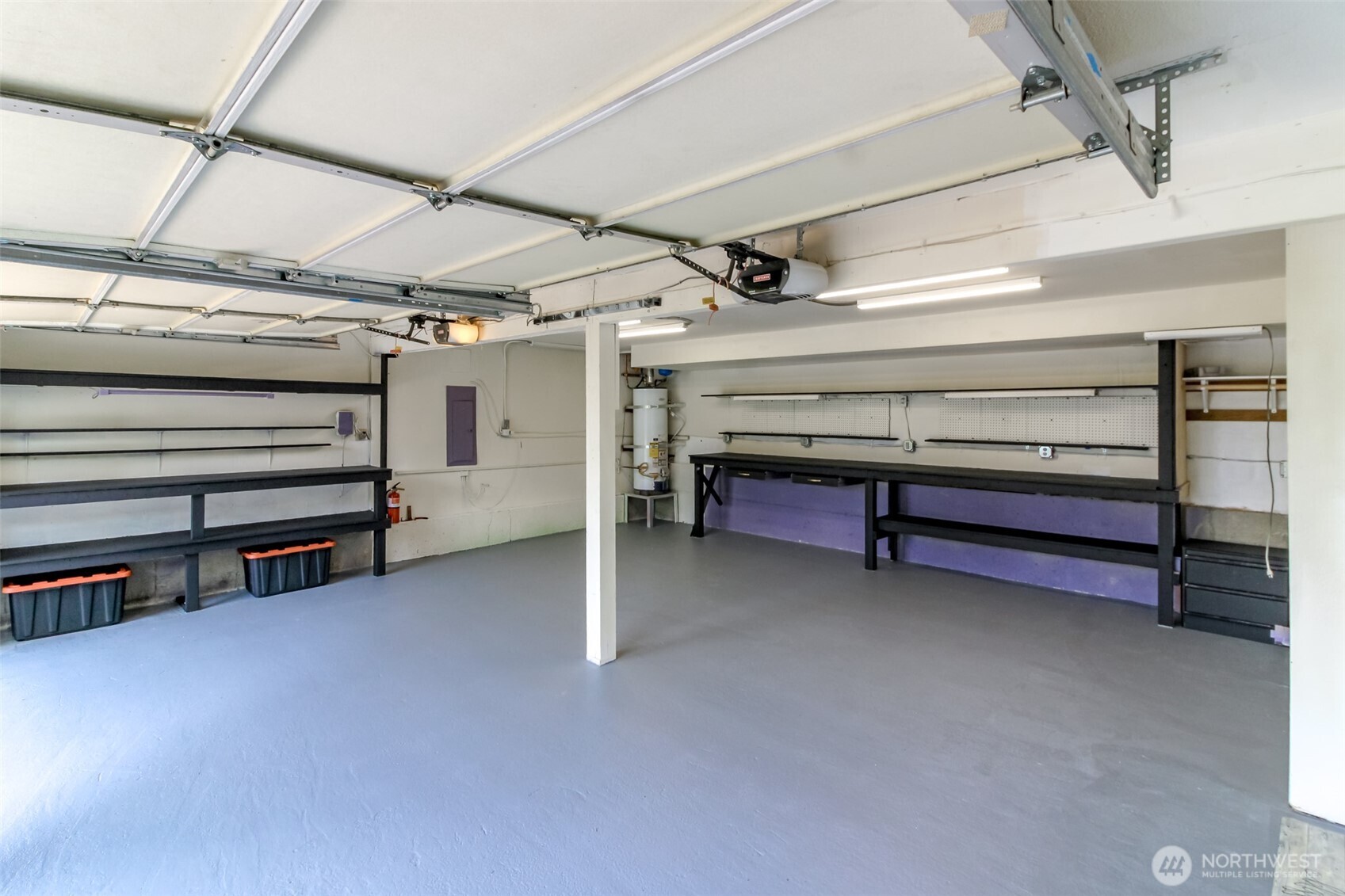 Spacious Two Car Garage with Workbench and Storage