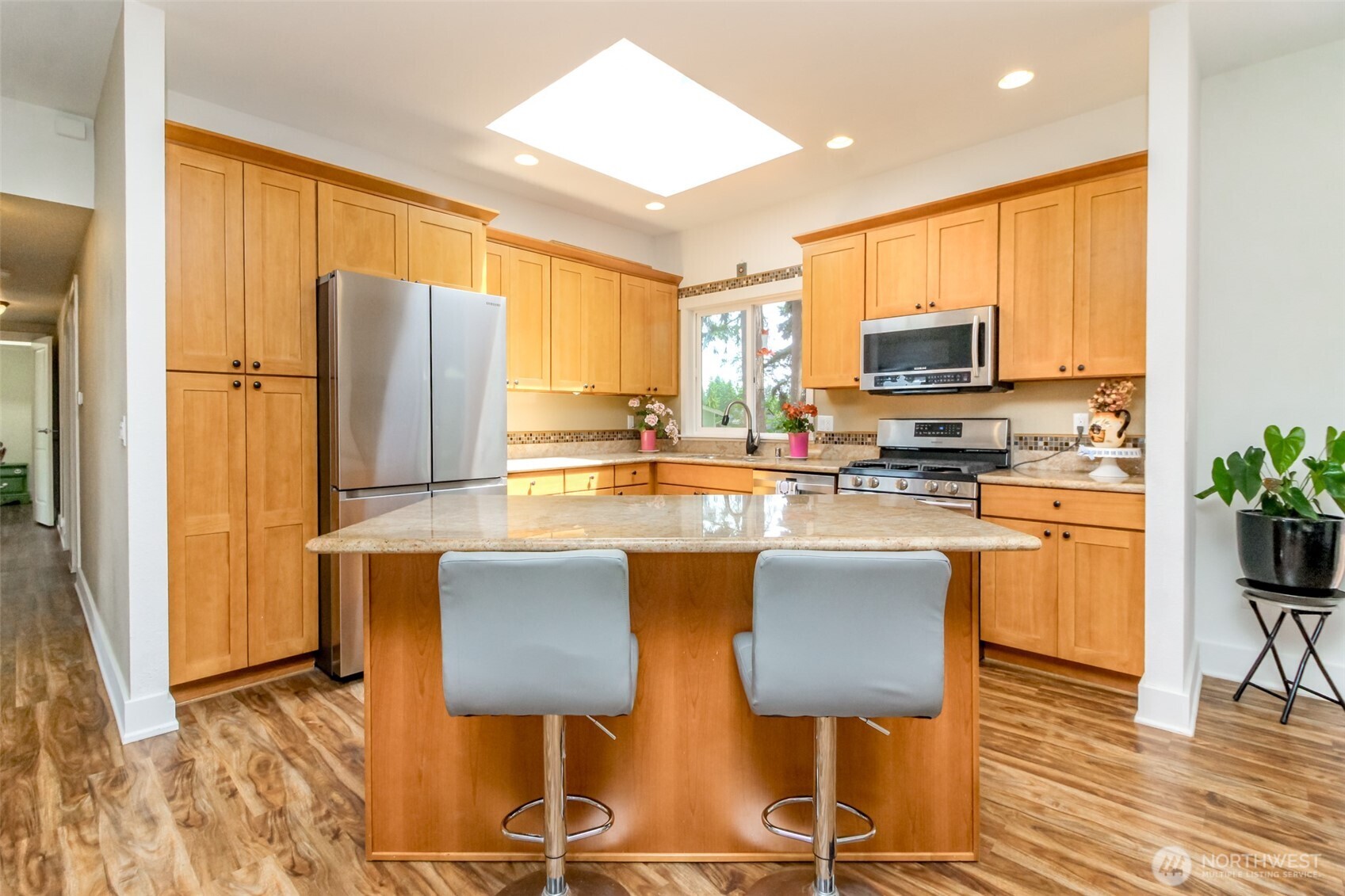 The skylight above the kitchen island fills the space with light!