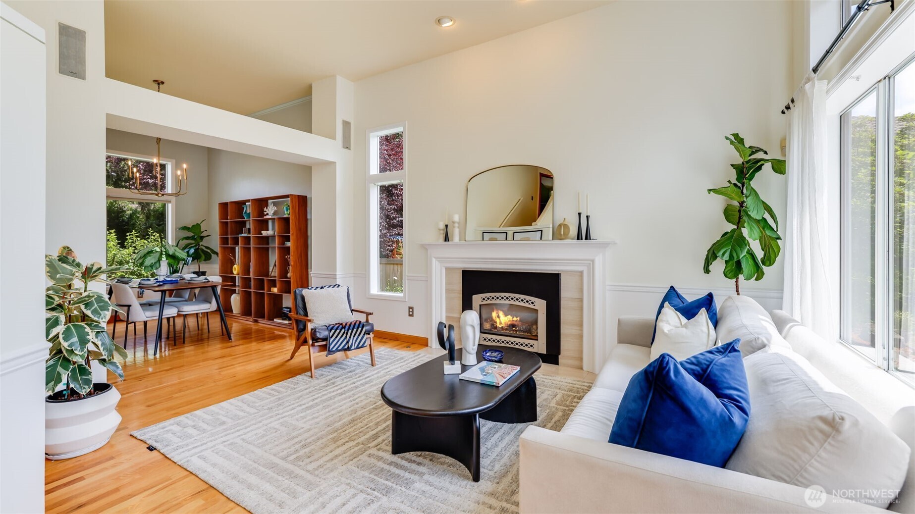 Upon entering, a grand fireplace commands attention—an ideal spot to unwind and enjoy cozy evenings by the fire. This is one of two inviting living areas within the home!
