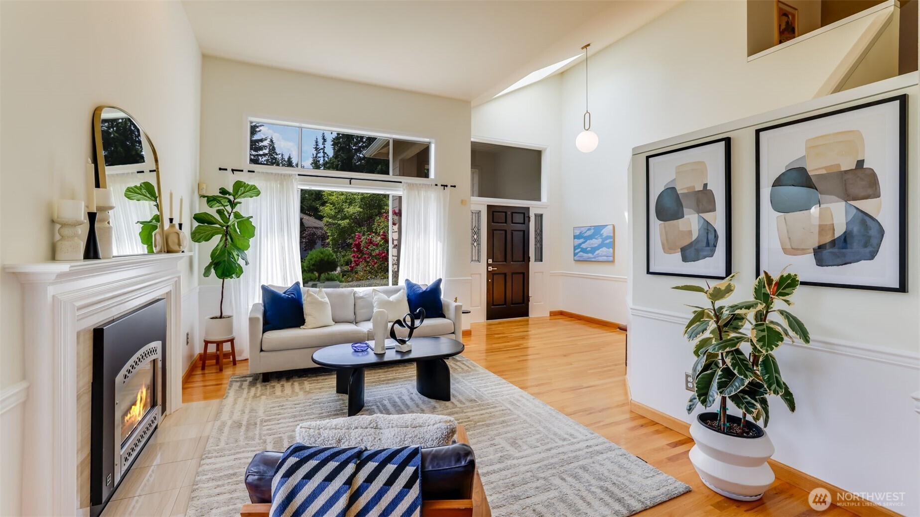 Lofty ceilings and generous windows flood the room with light, providing stunning walls for your personal décor. This inviting area welcomes you to step inside and find tranquility