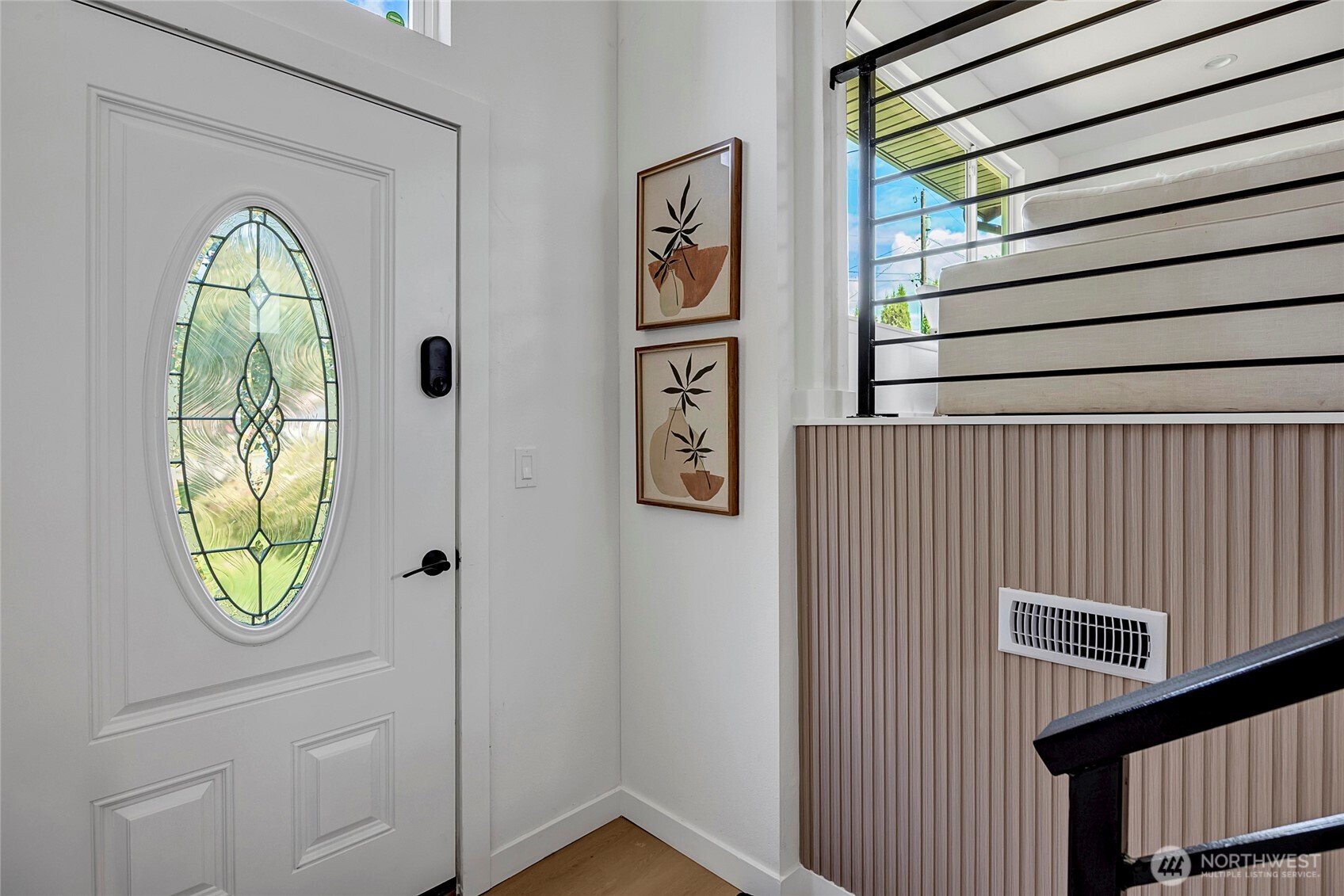 Roomy entry with designer accents.