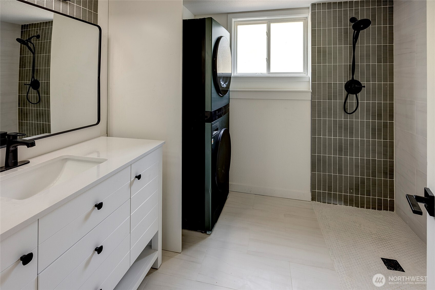 Laundry room with 3/4 bath.
