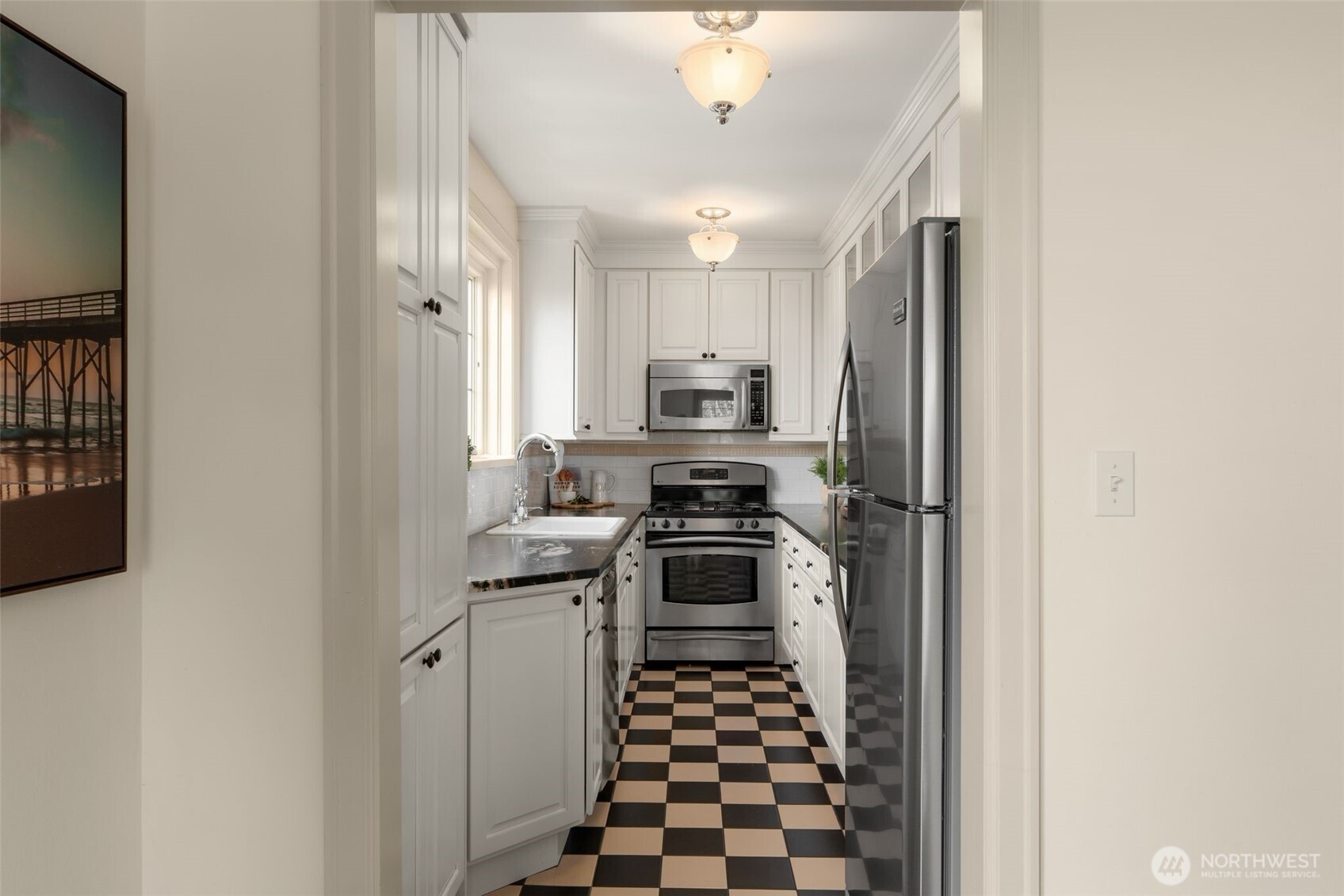Titanium Gold Granite Counters. One beautiful feature of this is inclusion of tiny red garnets that sparkle in the sunlight!