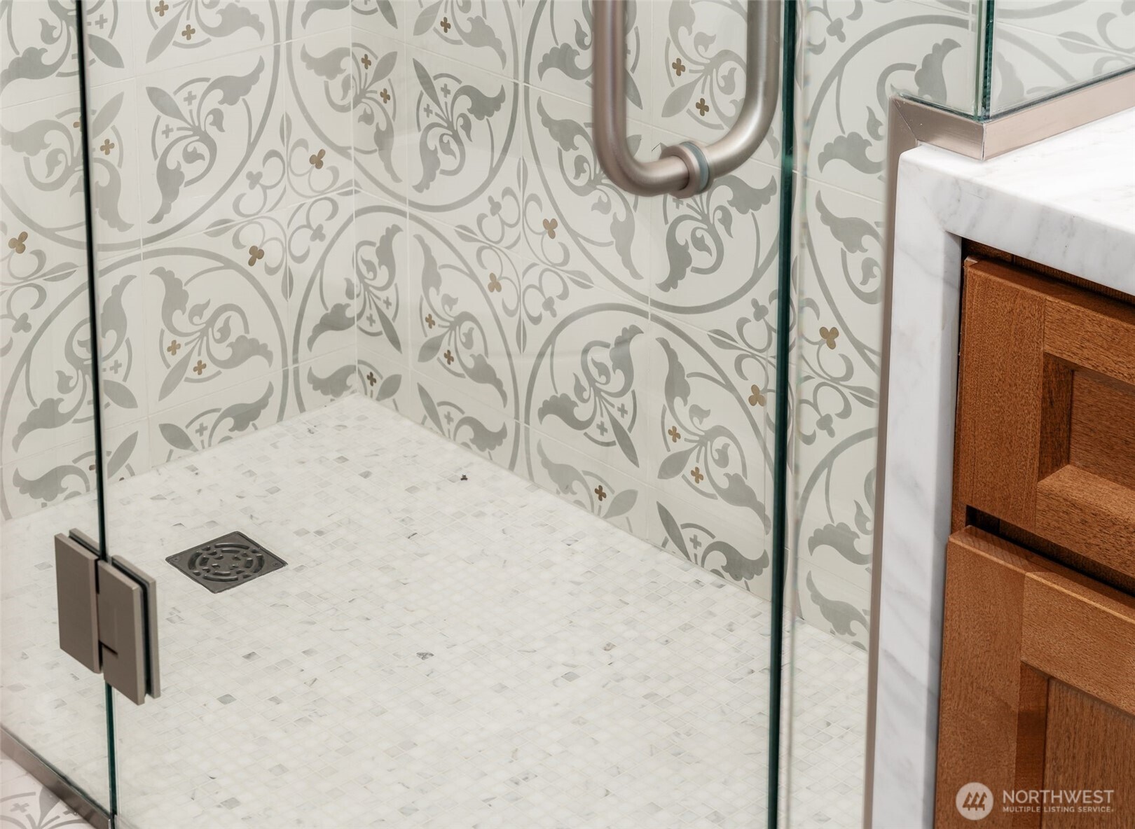 Ensuite Bathroom Remodel in 2024. Carrara Marble Counters, Custom Maple Vanity from Seattle Cabinets.  Concrete Tiles with Brass Insets (!), Brass Fixtures, and Heated Floors on a Timer.