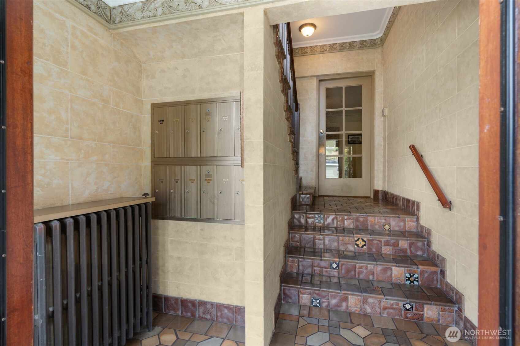 Beautiful Mahogany Door Entry and One of the Three Original Antique Lights in the Home.