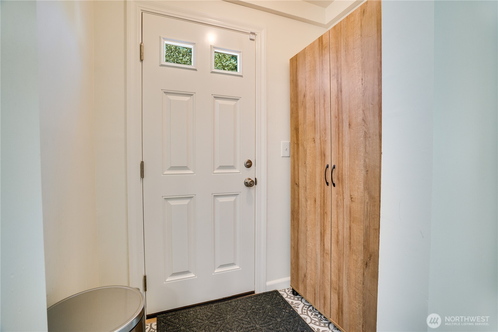Door to the backyard and pantry space.