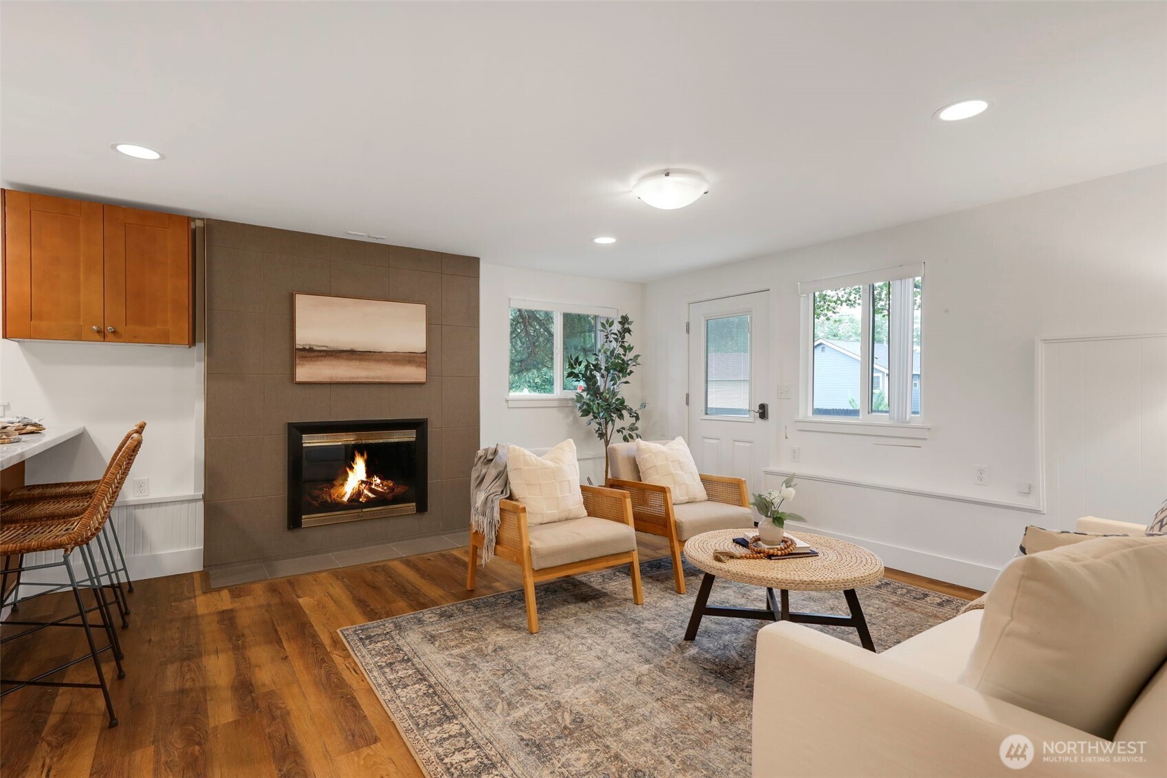 Lower wood burning fireplace.