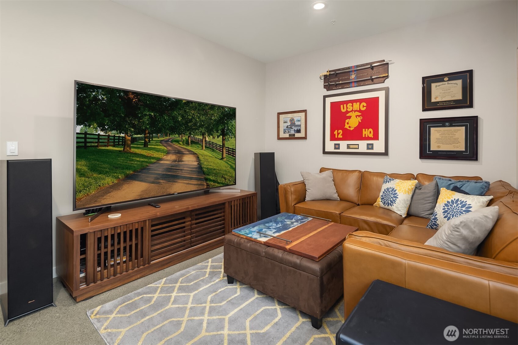 Versatile den with ample natural light—ideal as a home office, media room, or guest lounge.