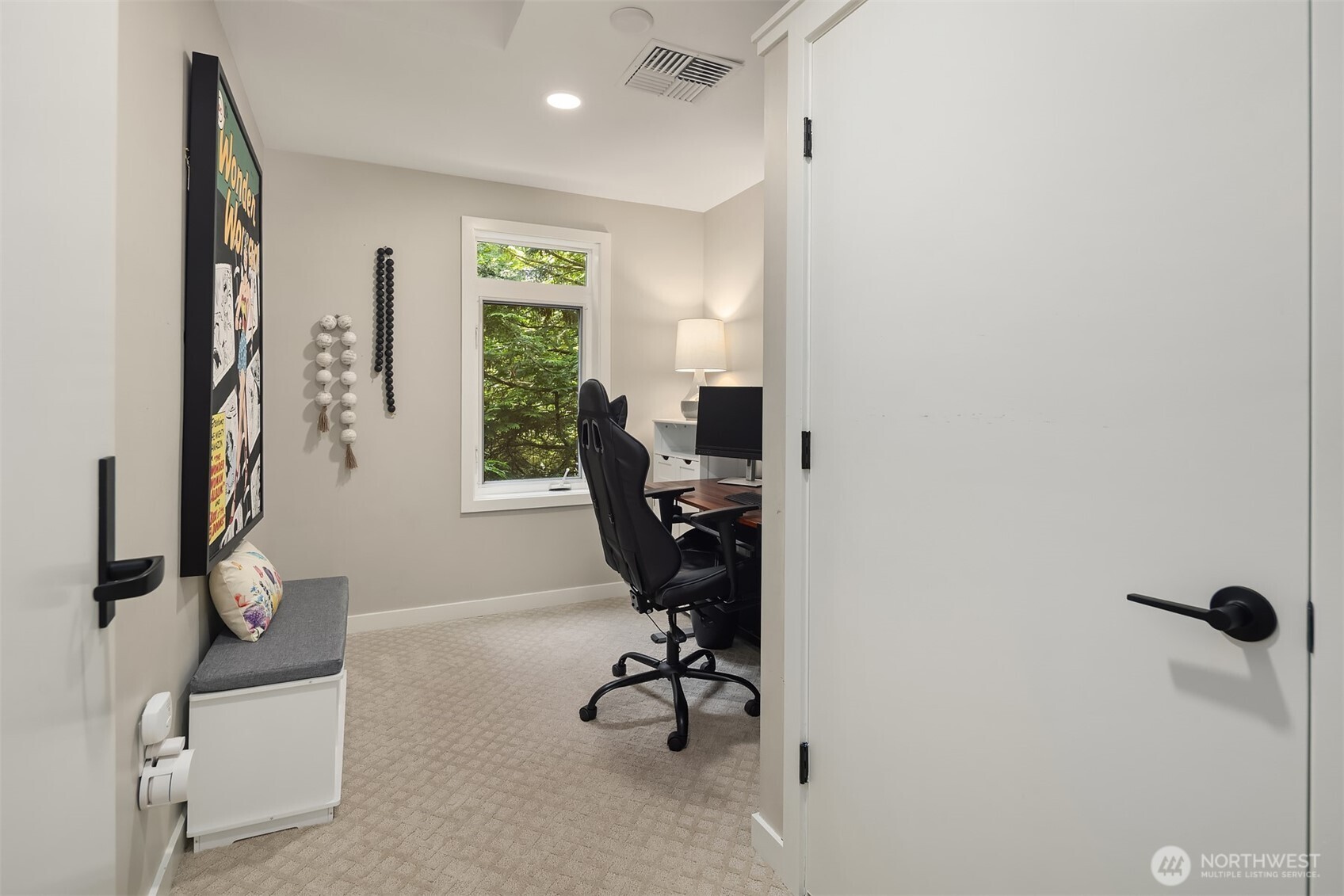 Tucked away and full of light—your ideal work-from-home setup awaits.