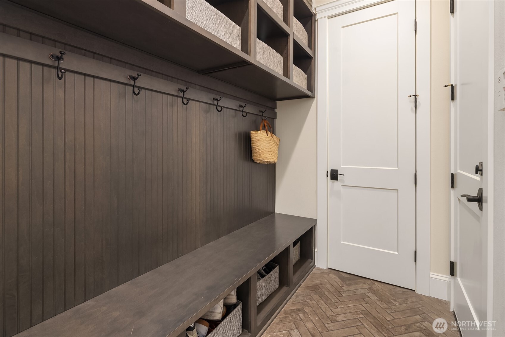 Drop your bags, kick off your shoes, and hide the chaos in style—this chic mudroom is built to handle real life, beautifully.