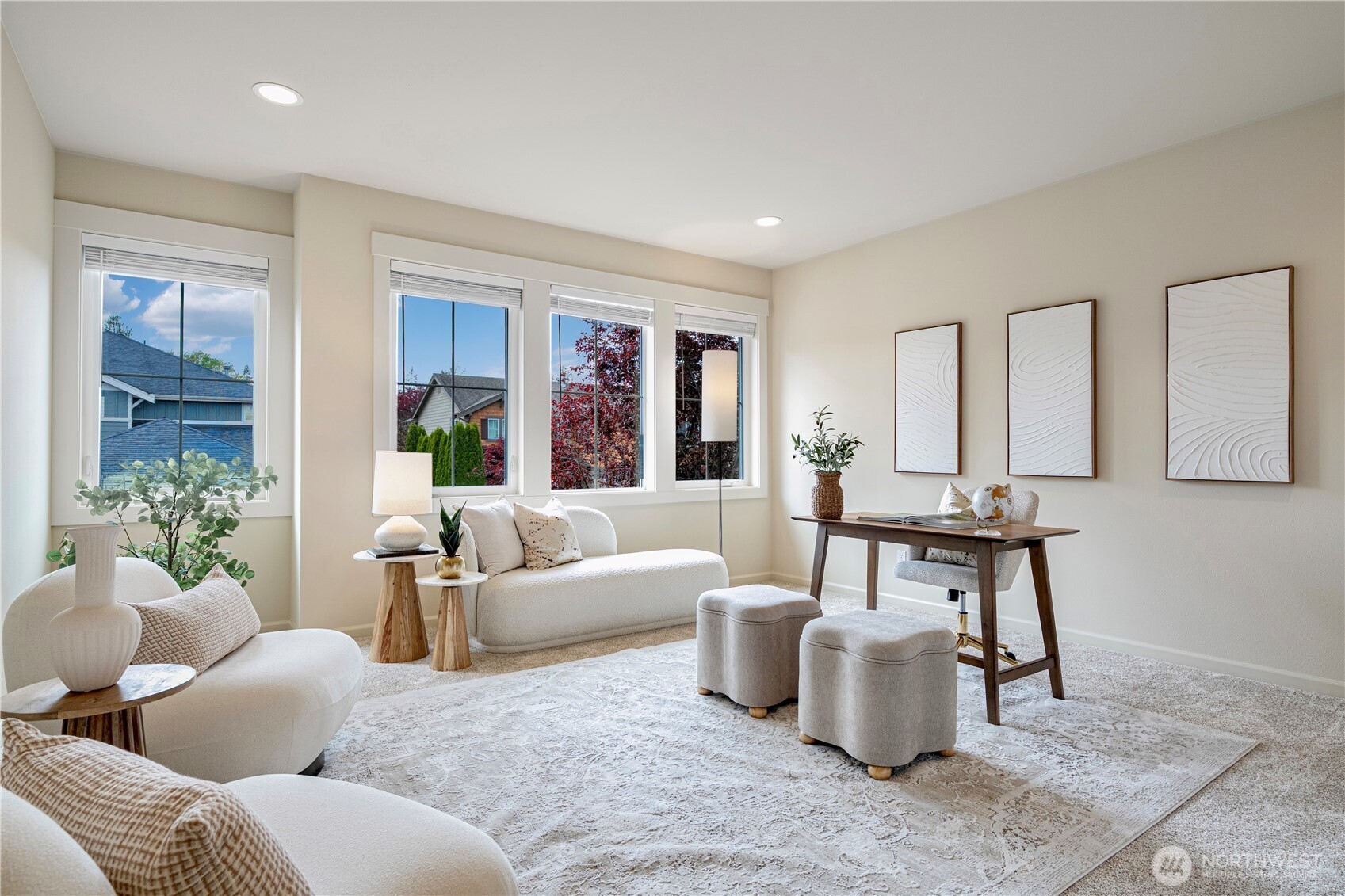 Flexible bonus room, bathed in natural light, with a large west-facing window that fills the space with warmth and brightness. Perfect as a 5th bedroom, office, or additional living space