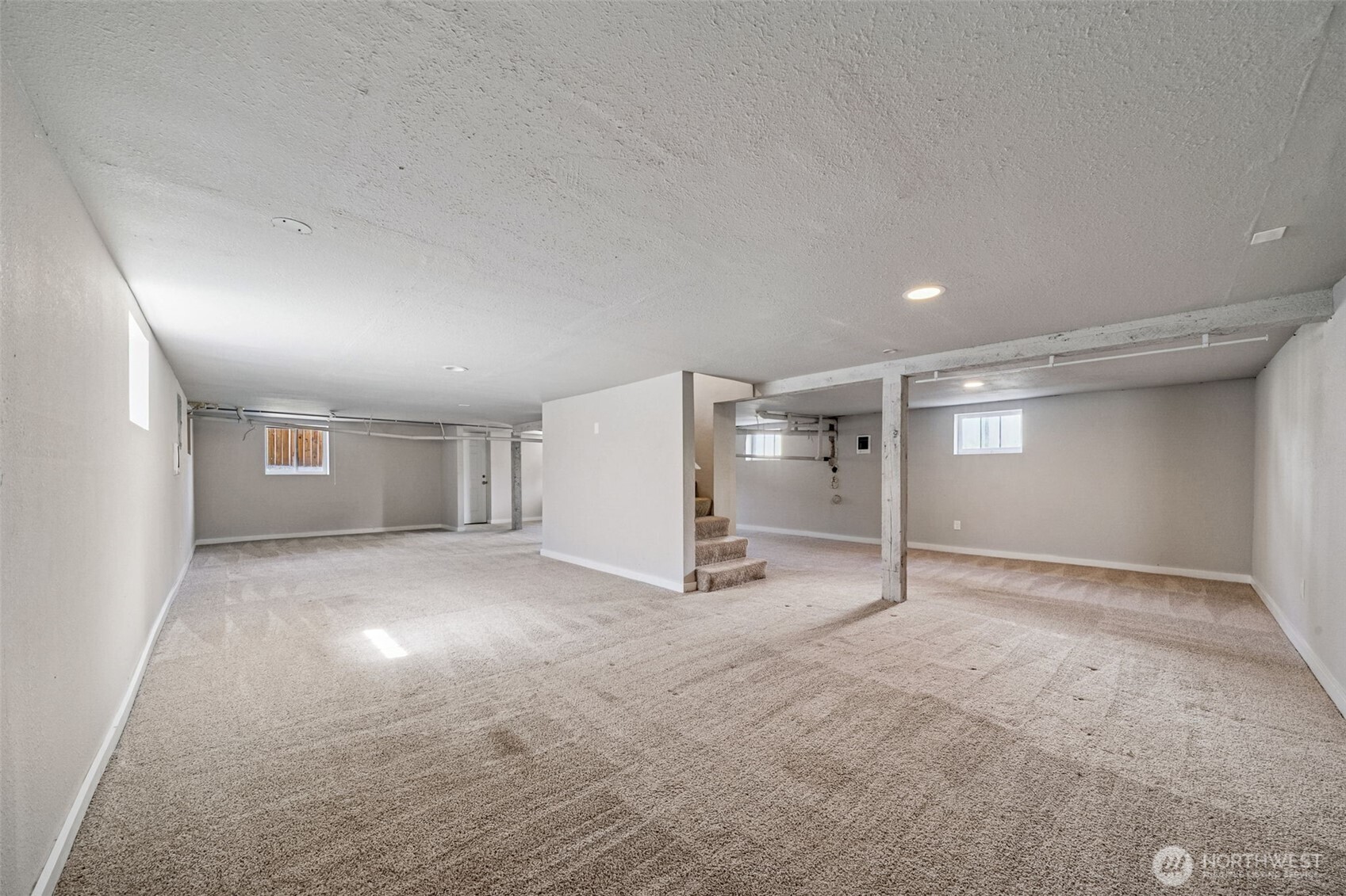 Basement rec room - plenty of space to design how you would like it. Section it off for more rooms or use as a gaming area.