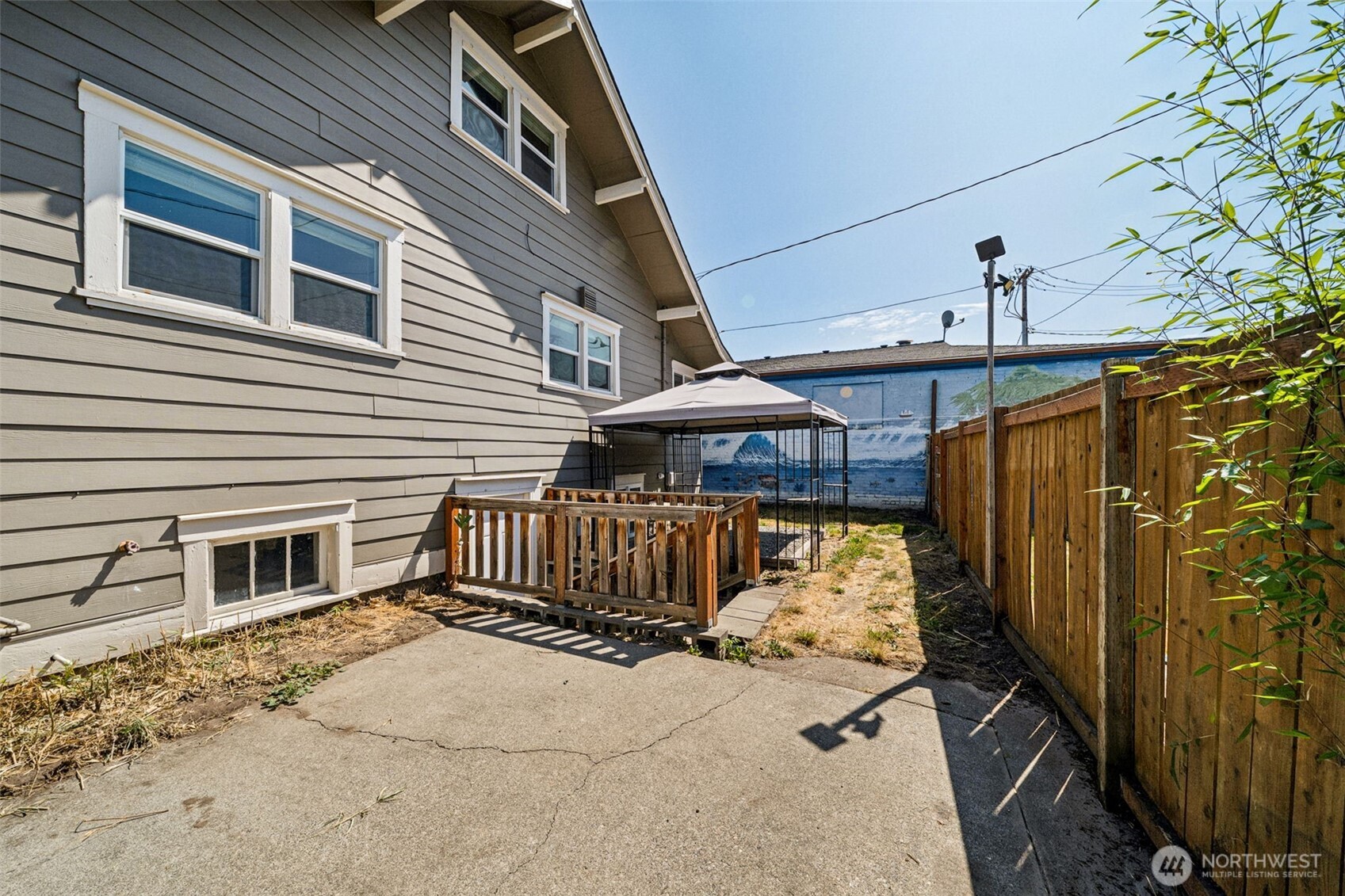 Backyard patio - stairs to basement/rec room.