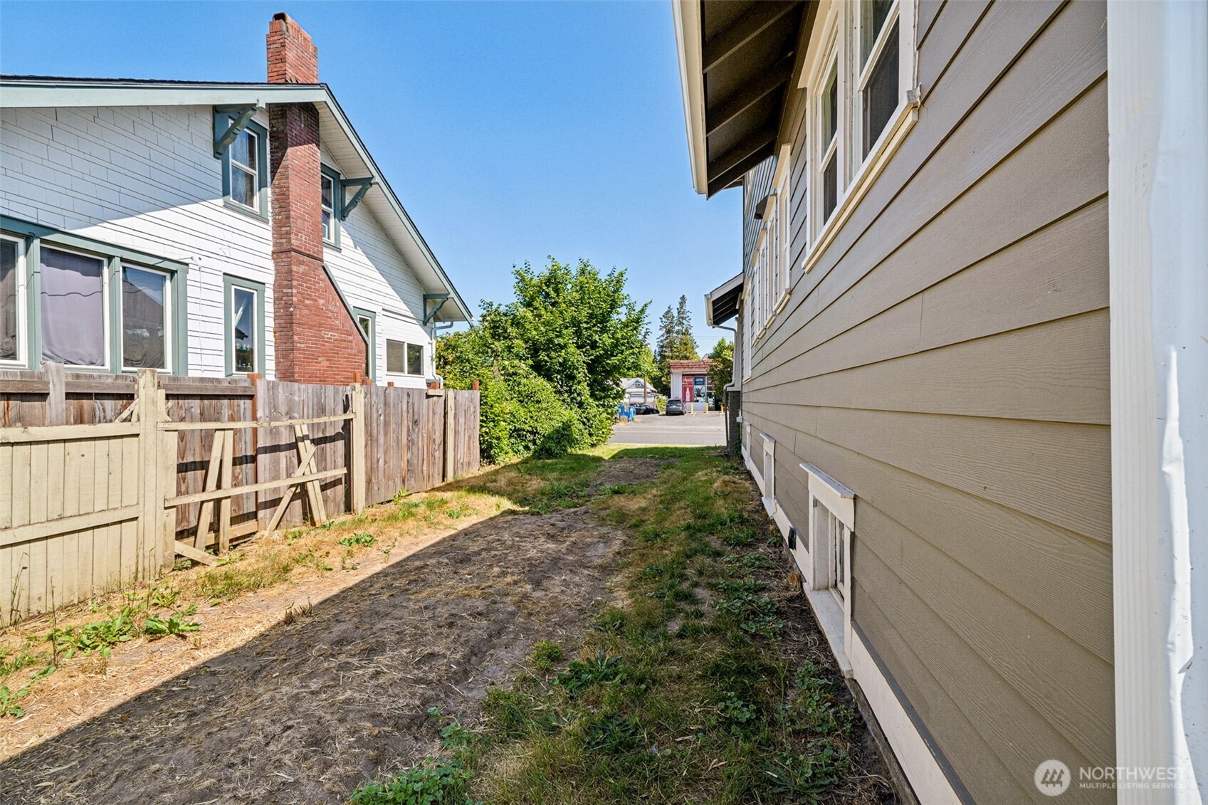 Side yard - tenant had a trailer parked here. Park yours here or reseed to your liking.