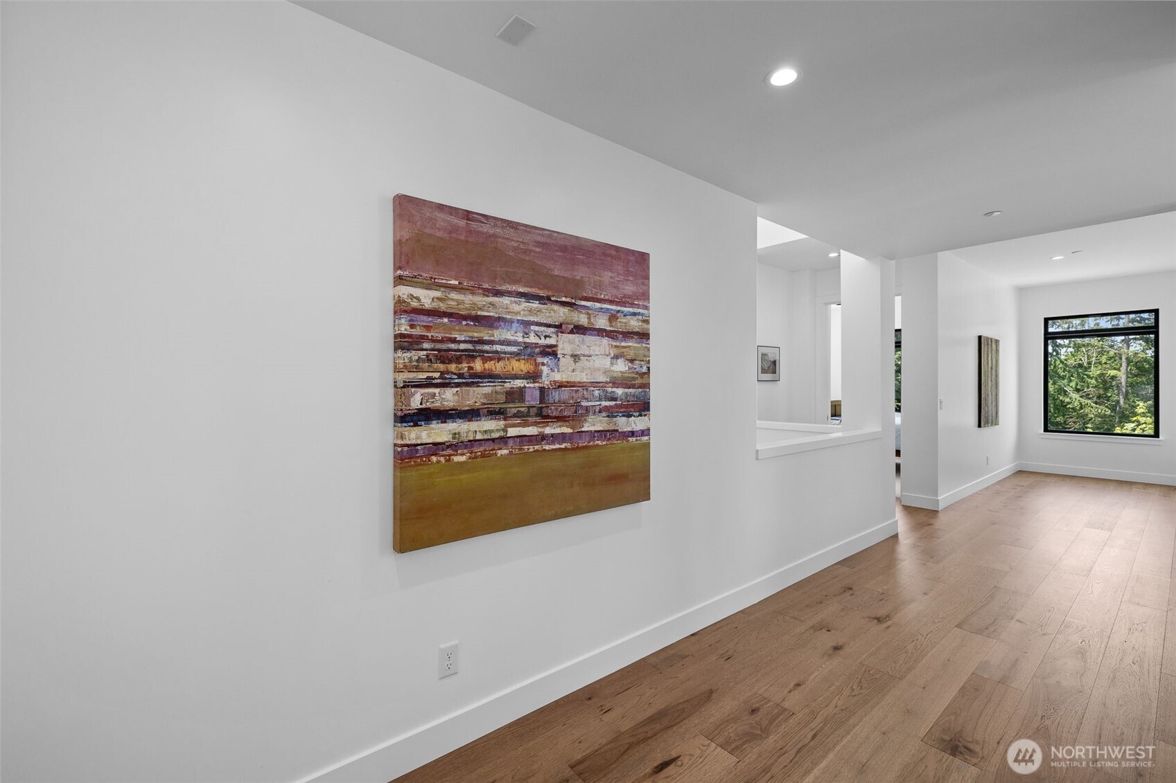Mid-Level has a full length gallery Hall which could be used as study nooks or a library as well.