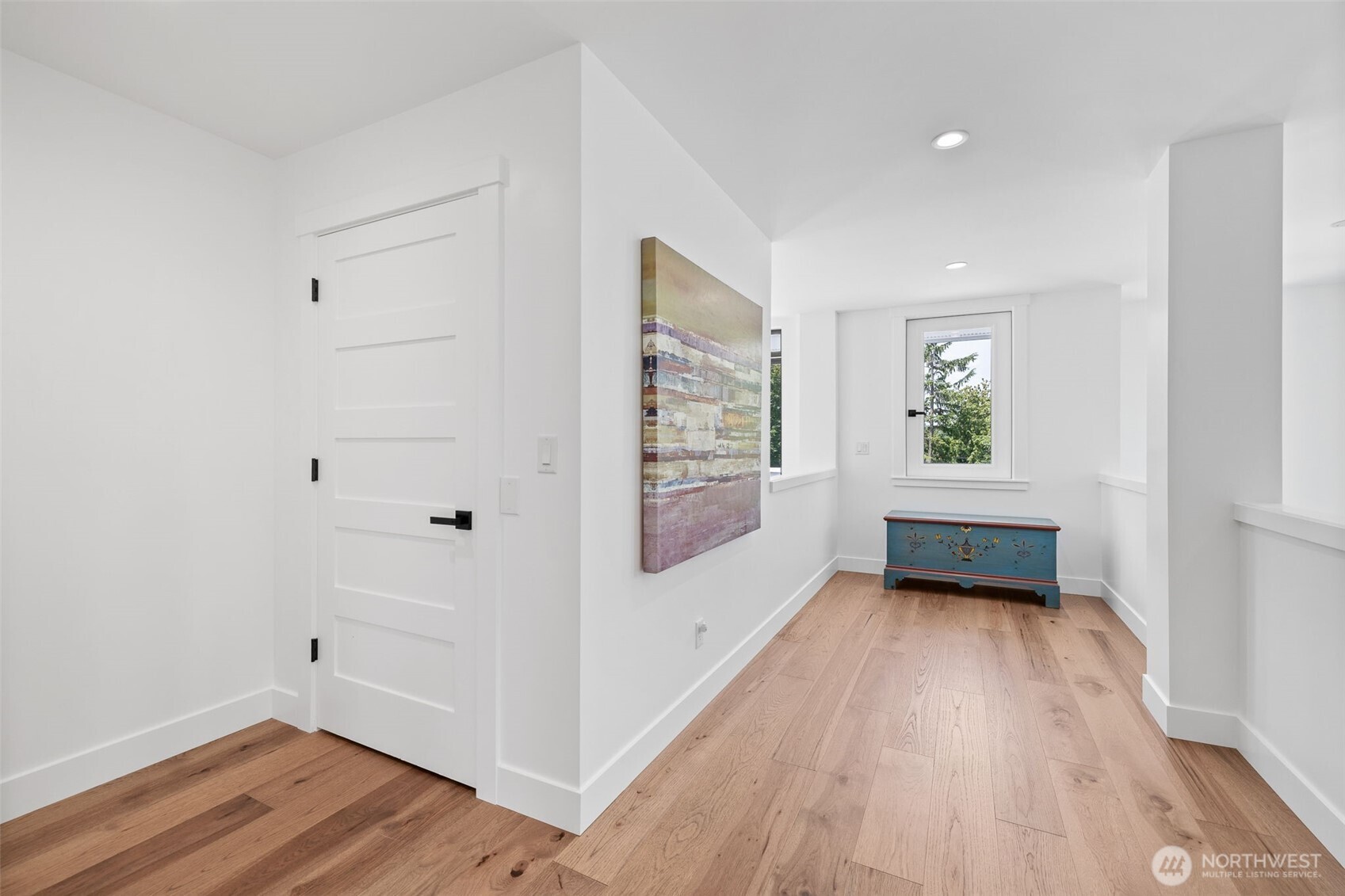 Upper level primary - elevator door and gallery hall
