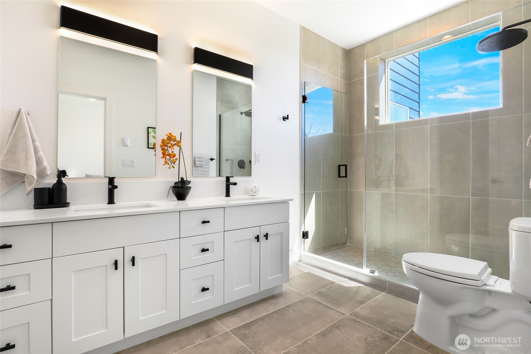 Attached spa-like full bathroom off of second primary bedroom